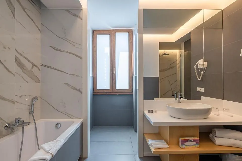 Bathroom in Atlante Star Hotel