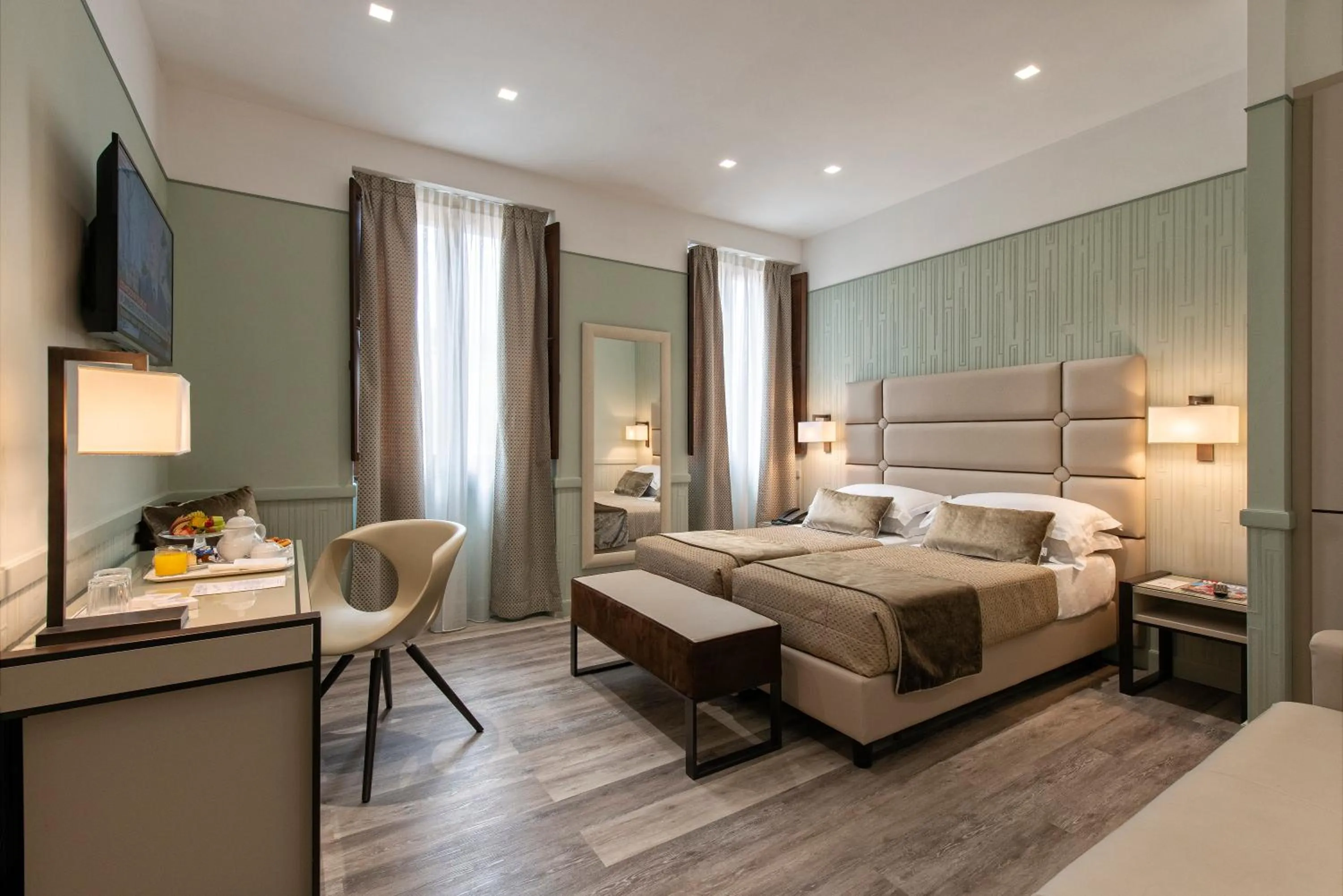 Bed in Atlante Star Hotel