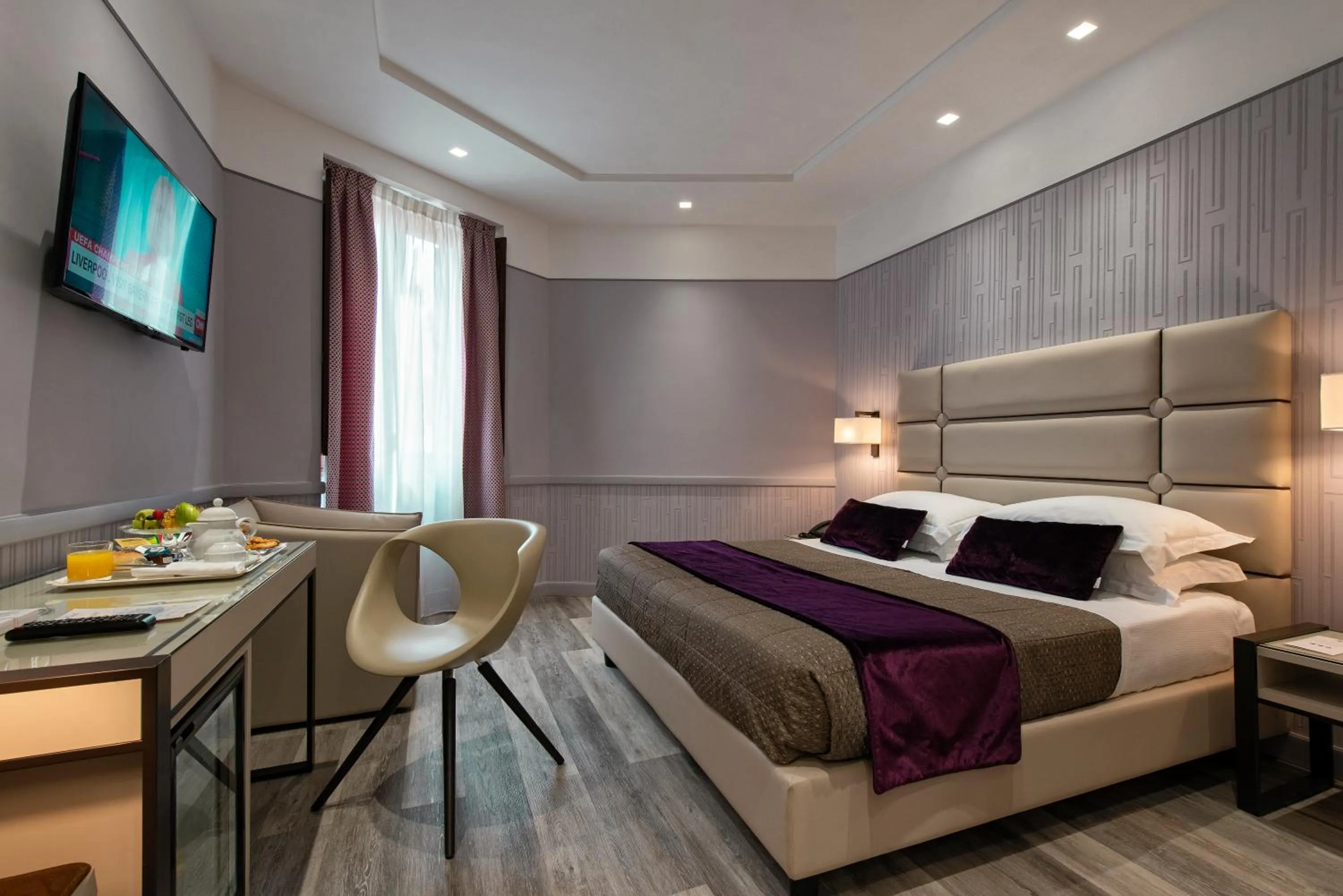 Bed in Atlante Star Hotel