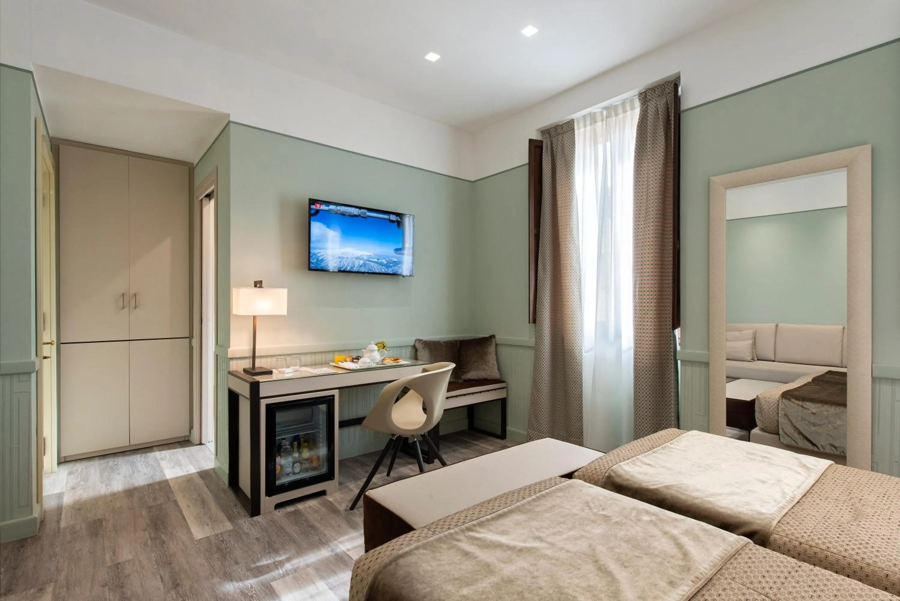 Bed in Atlante Star Hotel