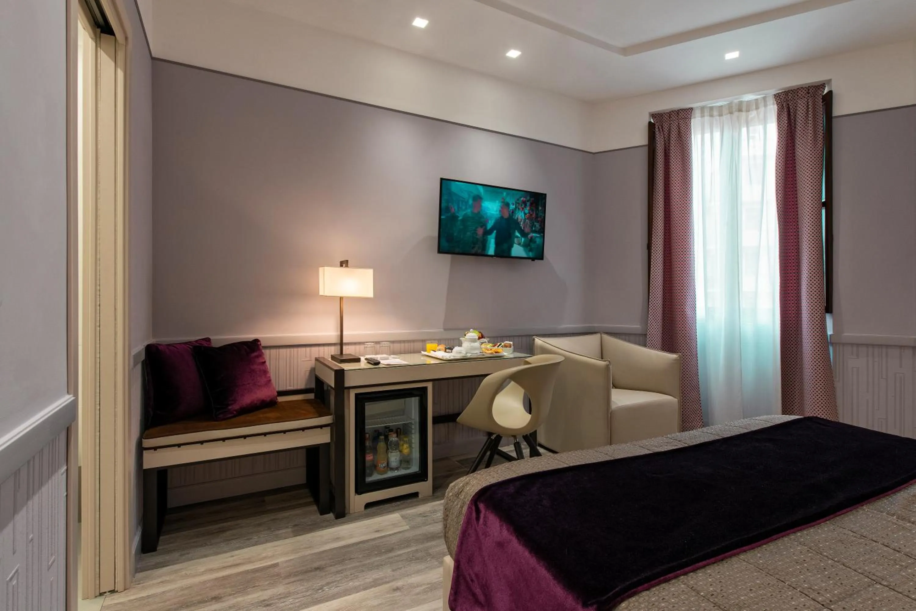 Bed in Atlante Star Hotel