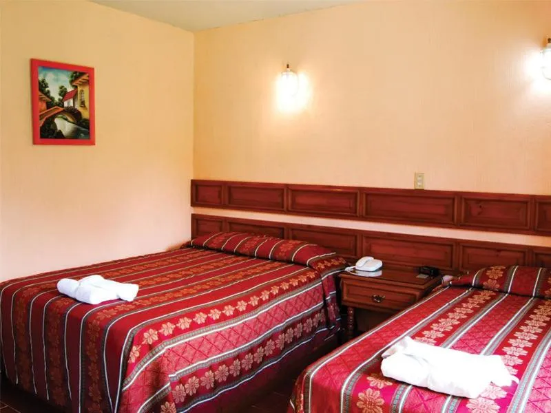 Bed in Hotel Arrecife de Coral