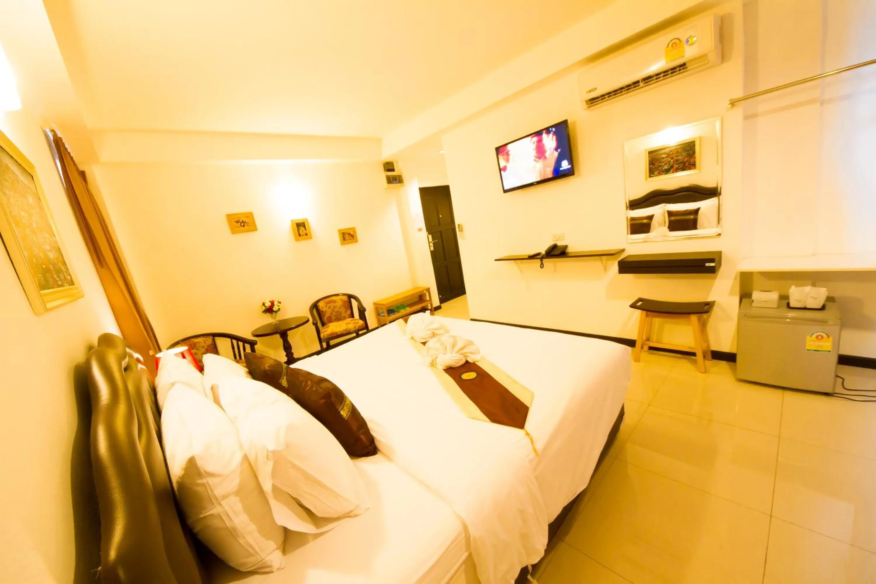 Photo of the whole room, Bed in TH beach hotel