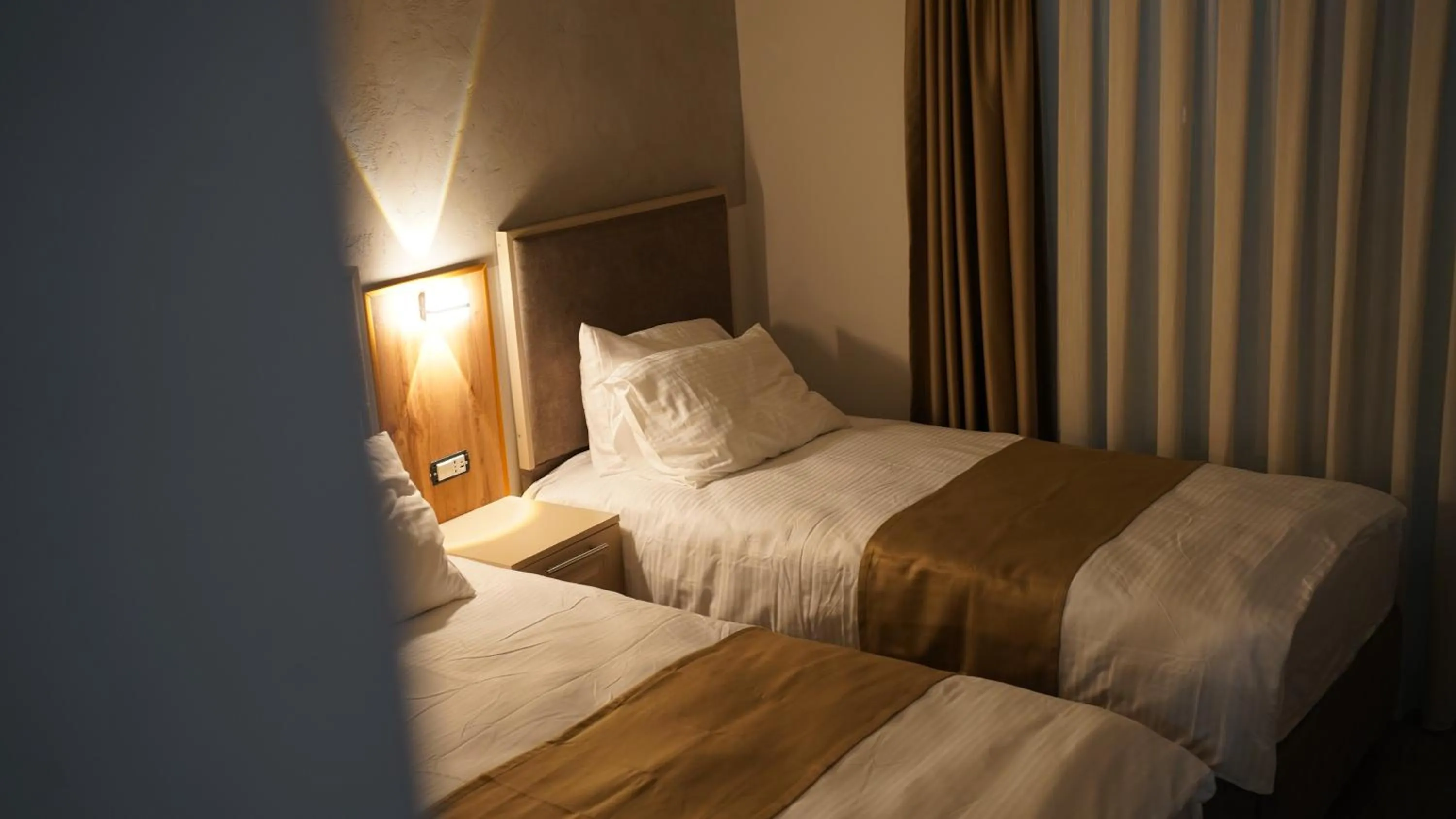 Bed in Arabella Hotel