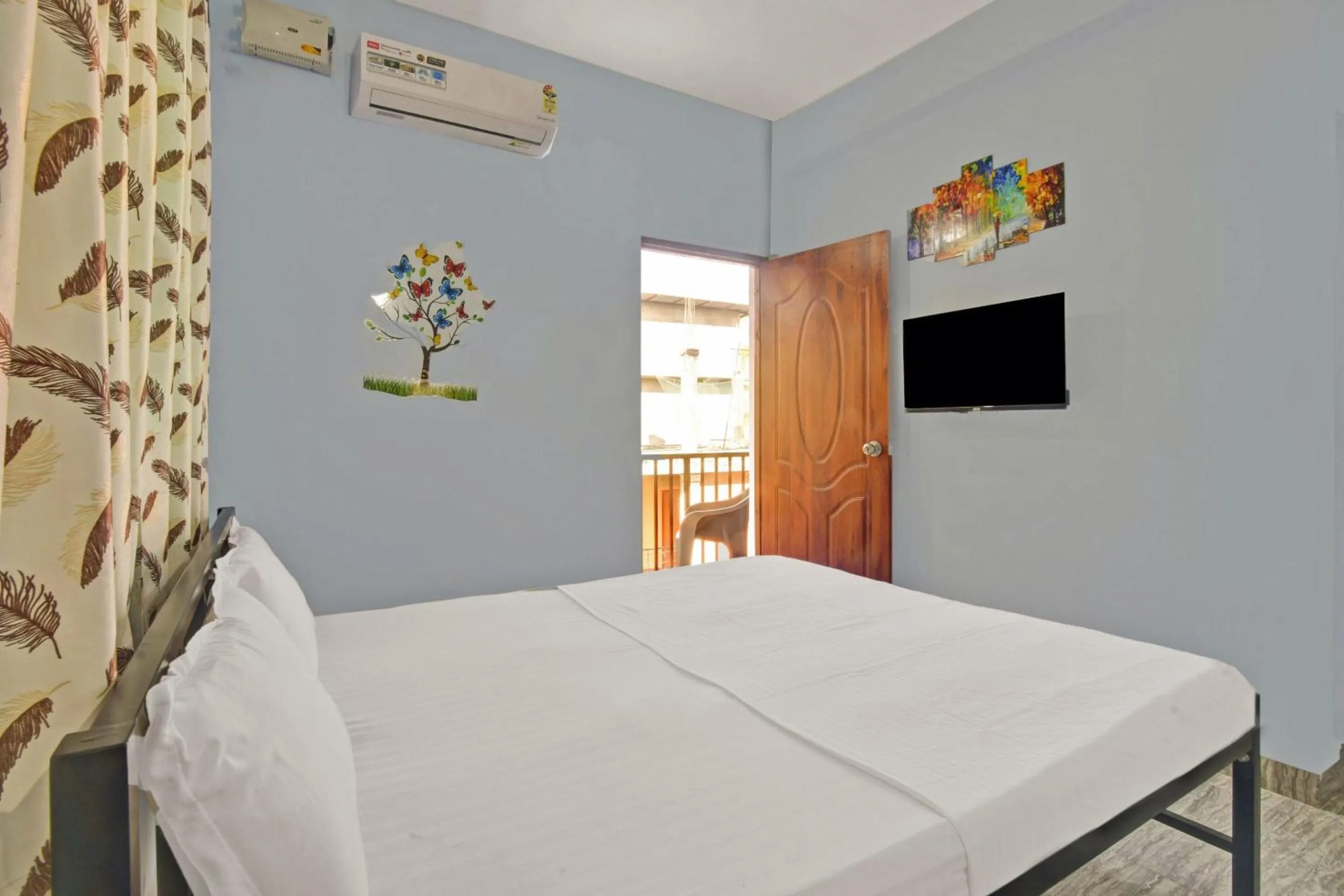 Bedroom in Hotel O by OYO Sai Leela