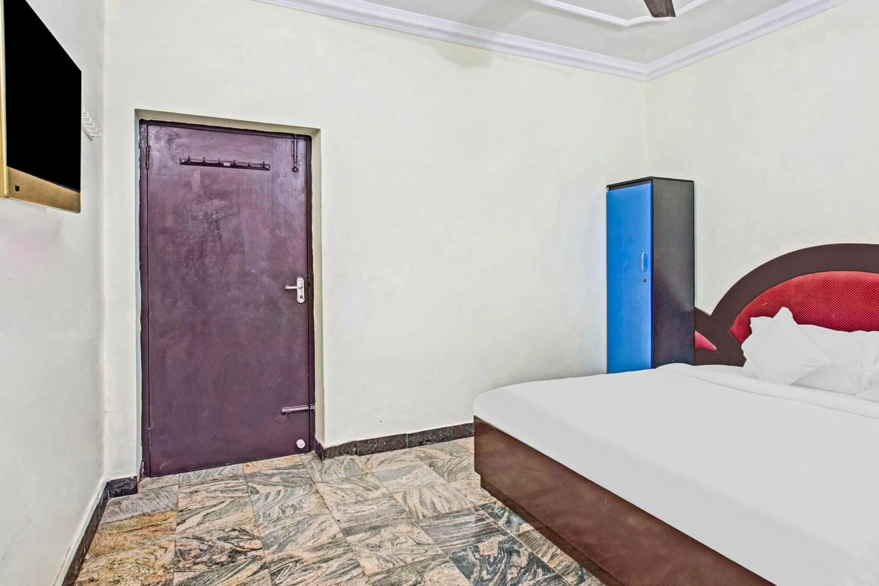 Bedroom in Hotel O Neethu Residency
