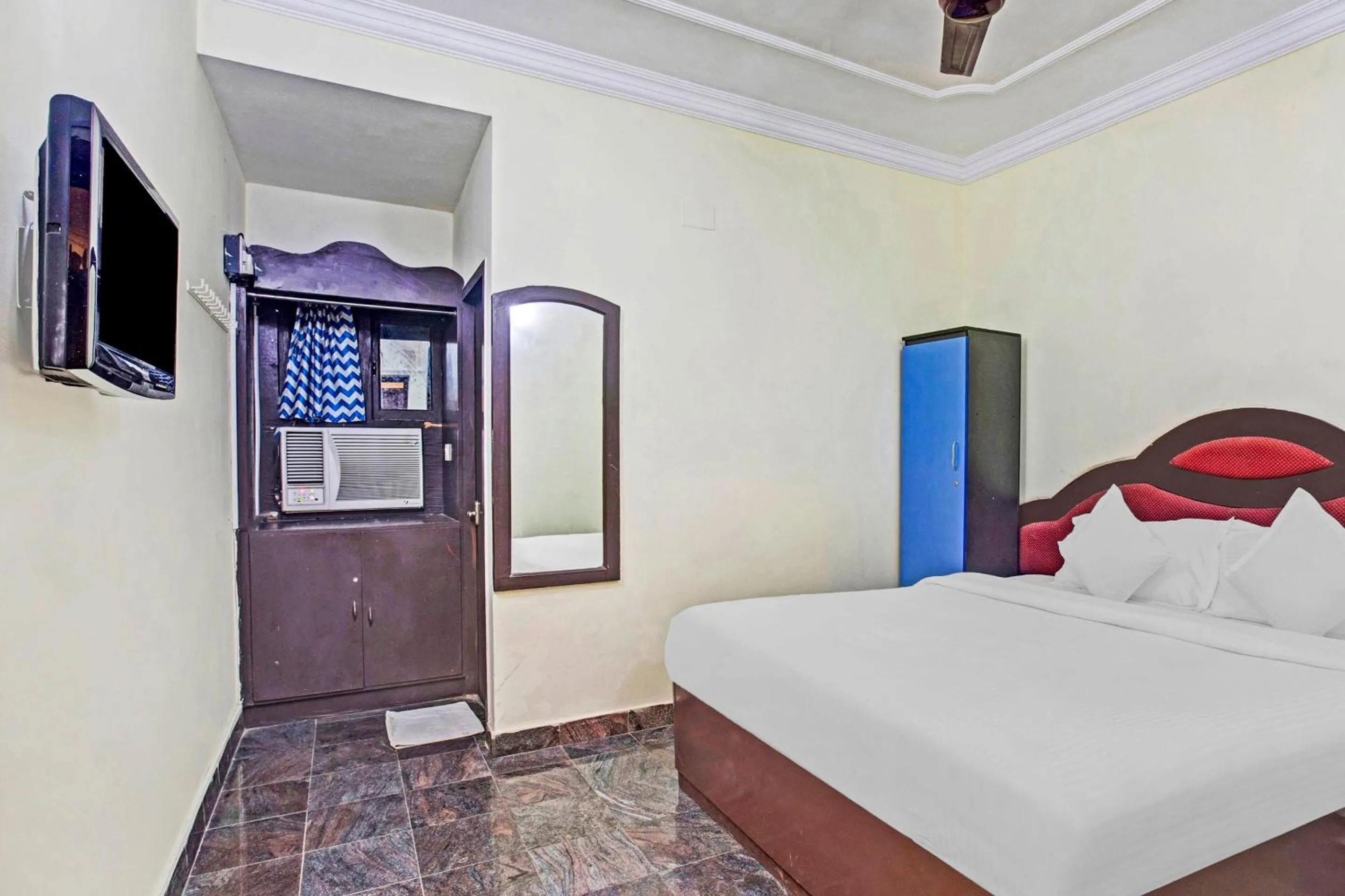 Bedroom in Hotel O Neethu Residency