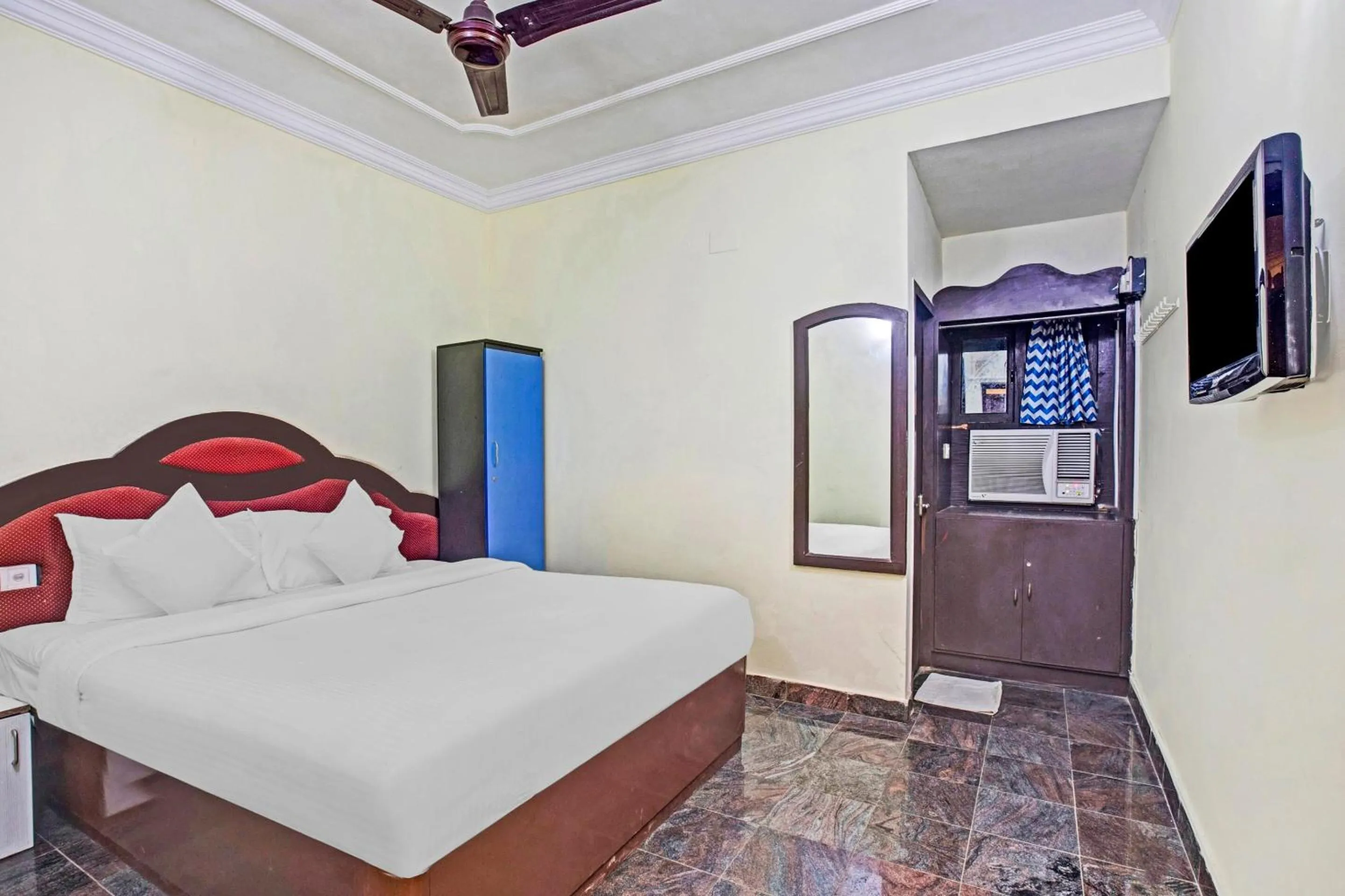 Bedroom in Hotel O Neethu Residency