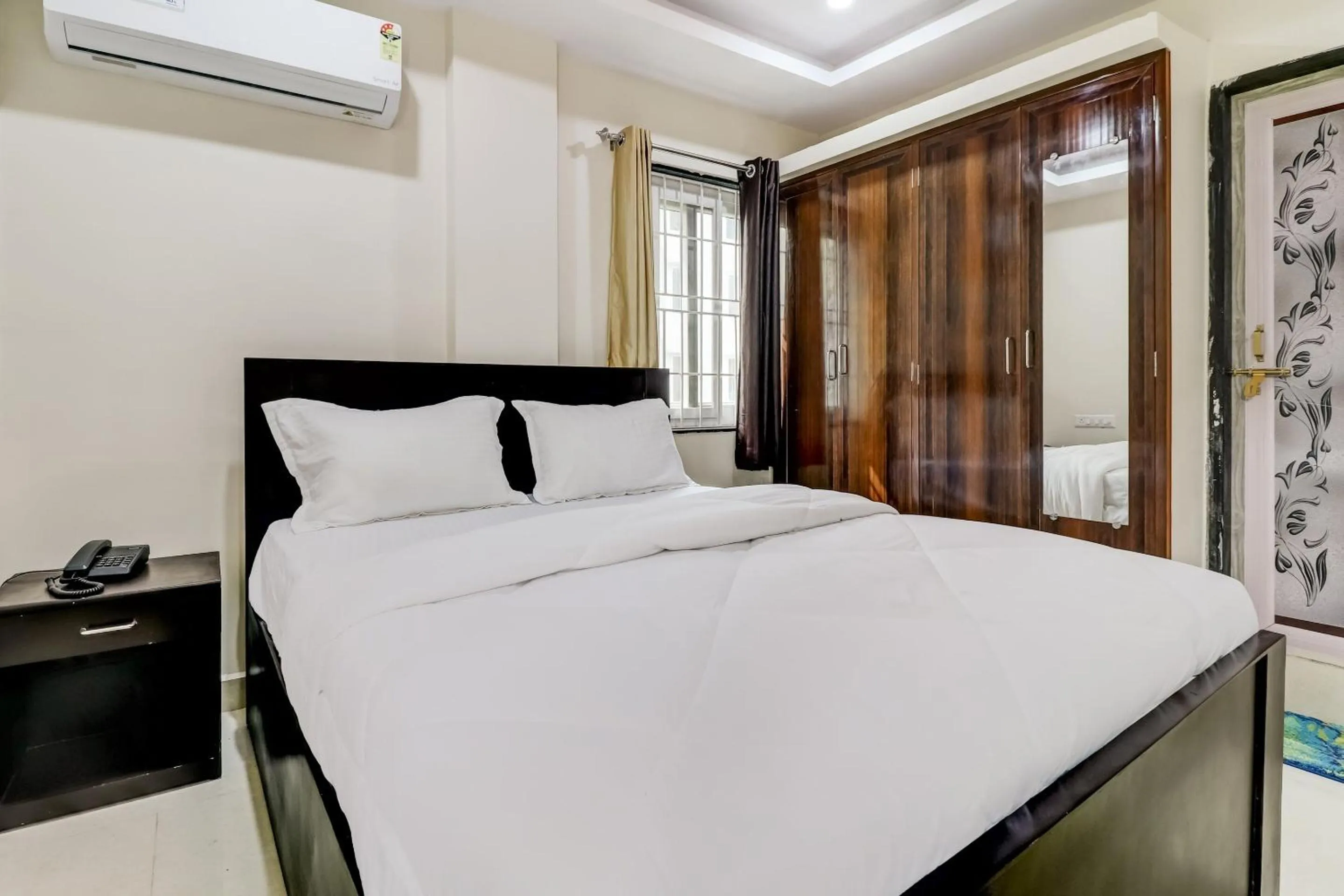 Bedroom in Hotel O Sri Singampalli Residency
