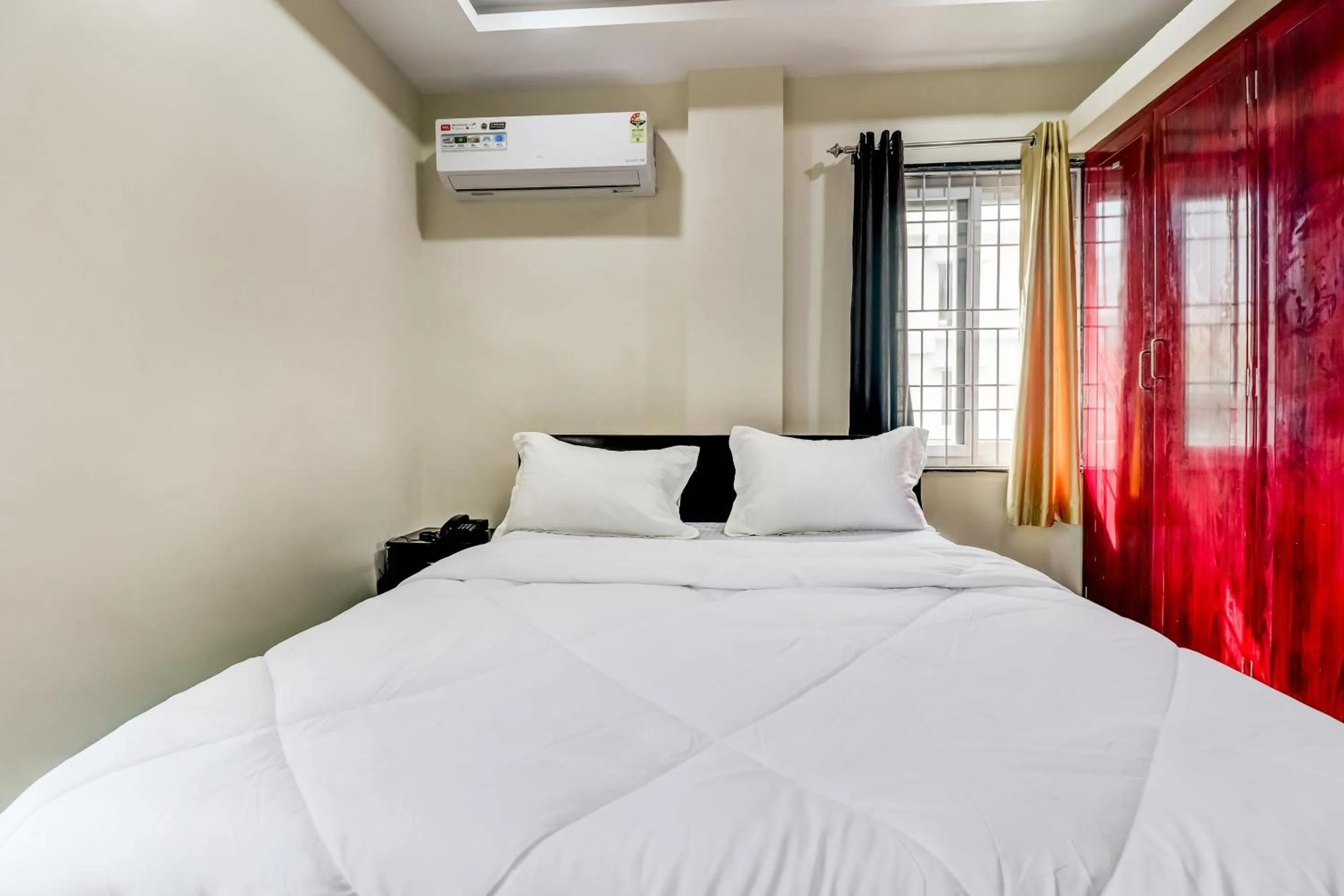 Bedroom in Hotel O Sri Singampalli Residency