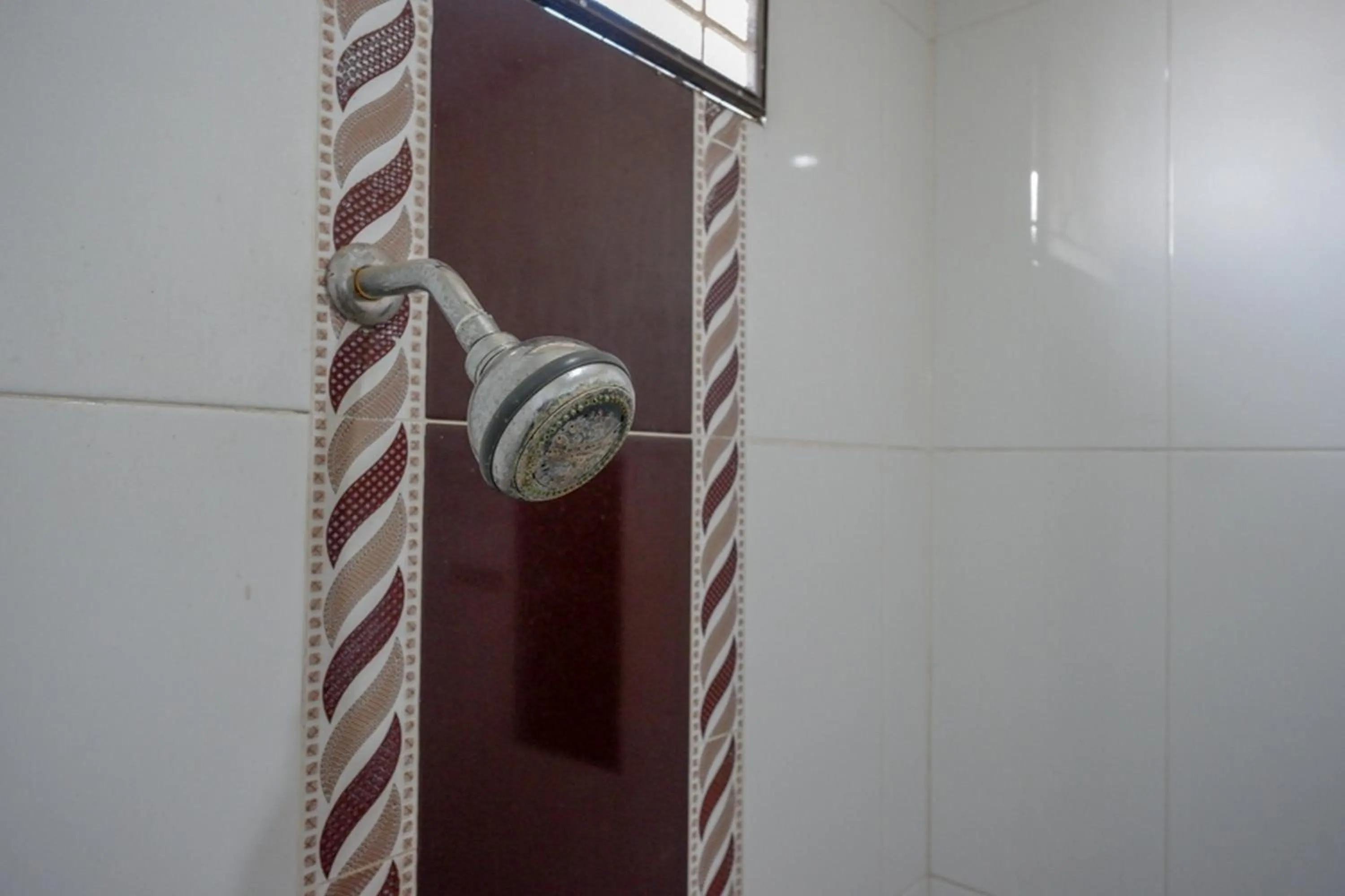 Bathroom in RedDoorz at Jalan Emmy Saelan Palu