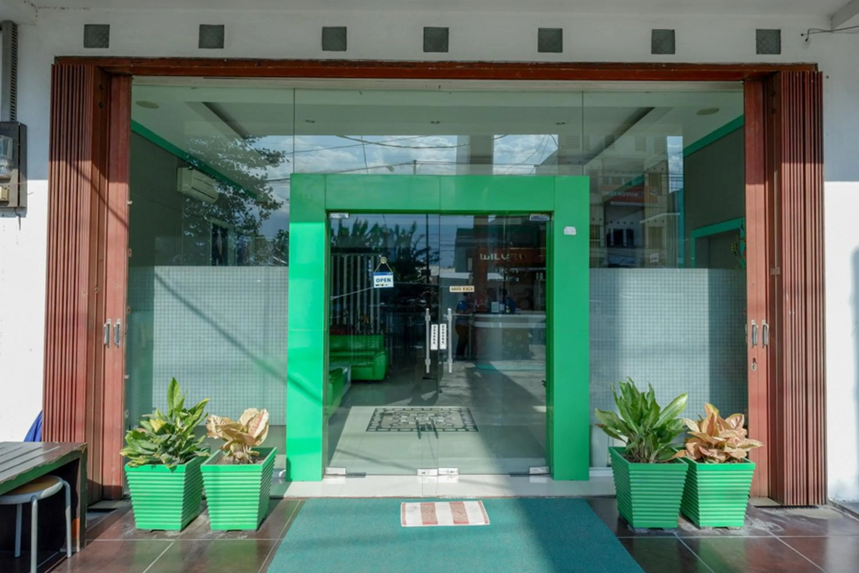 Facade/entrance in RedDoorz at Jalan Emmy Saelan Palu