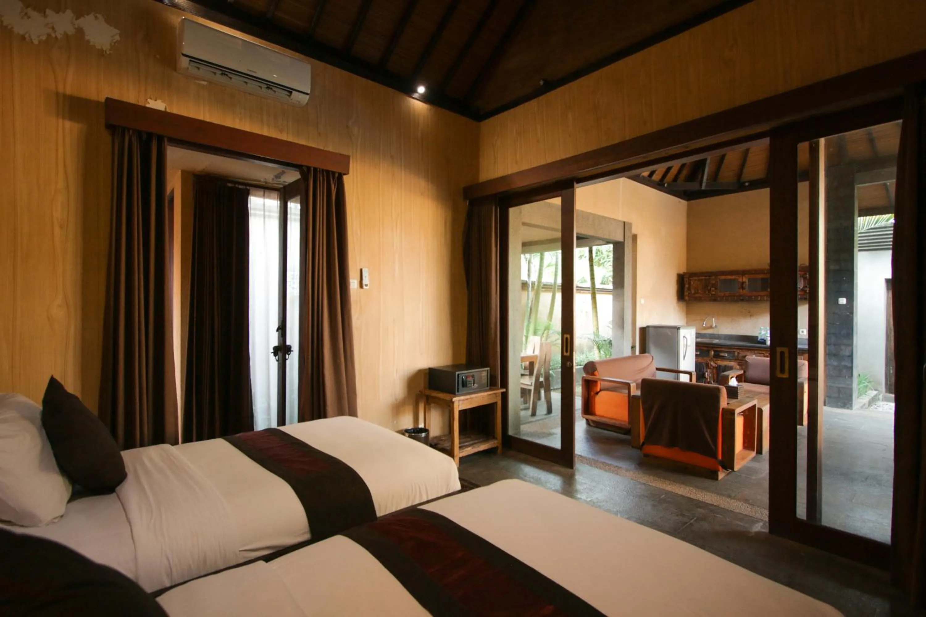 Bed in Gino Feruci Villa Ubud by KAGUM Hotels