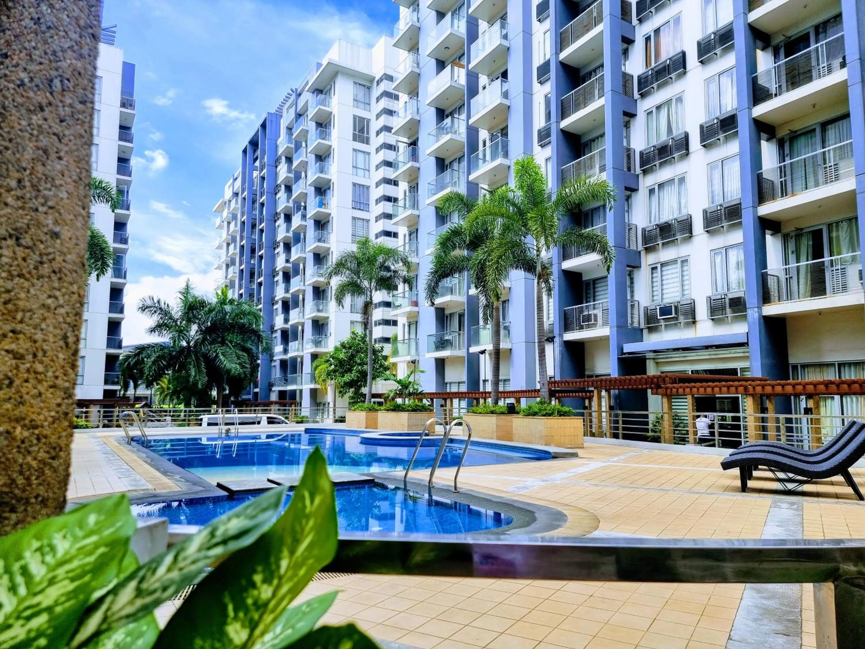 Swimming pool in One Palm Tree Villas Condo Across NAIA Terminal 3