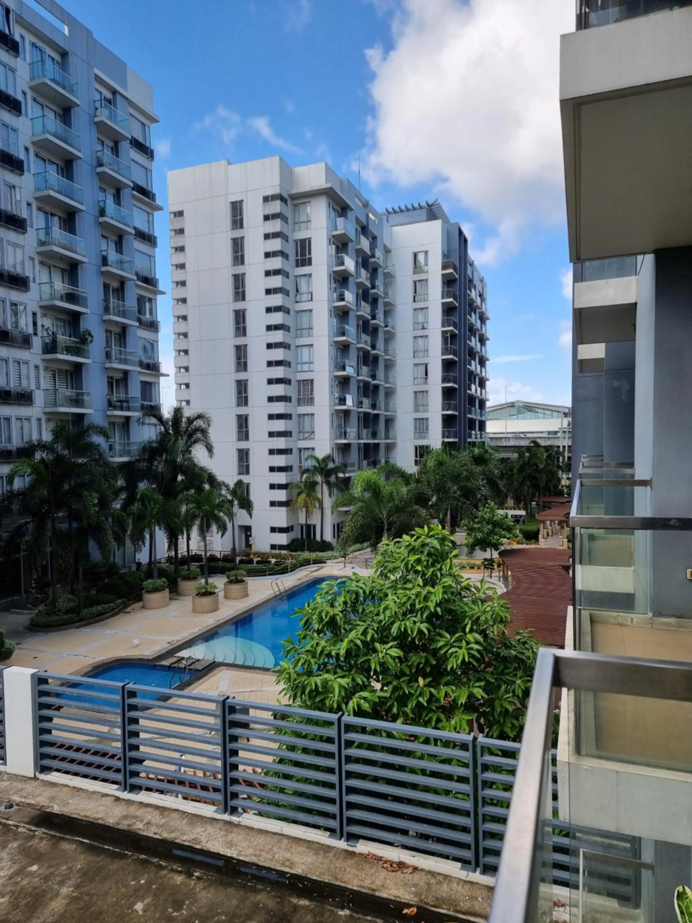 Pool view in One Palm Tree Villas Condo Across NAIA Terminal 3