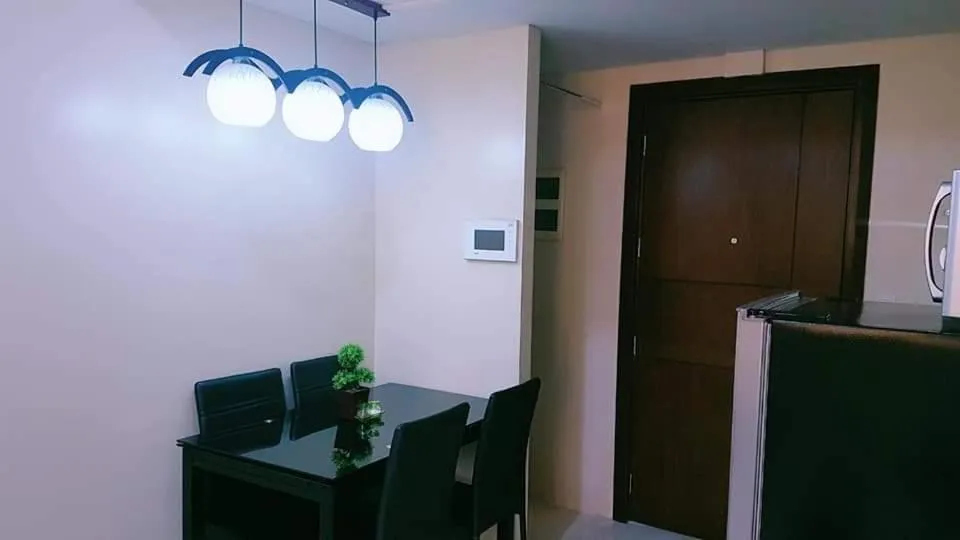 Dining area in One Palm Tree Villas Condo Across NAIA Terminal 3