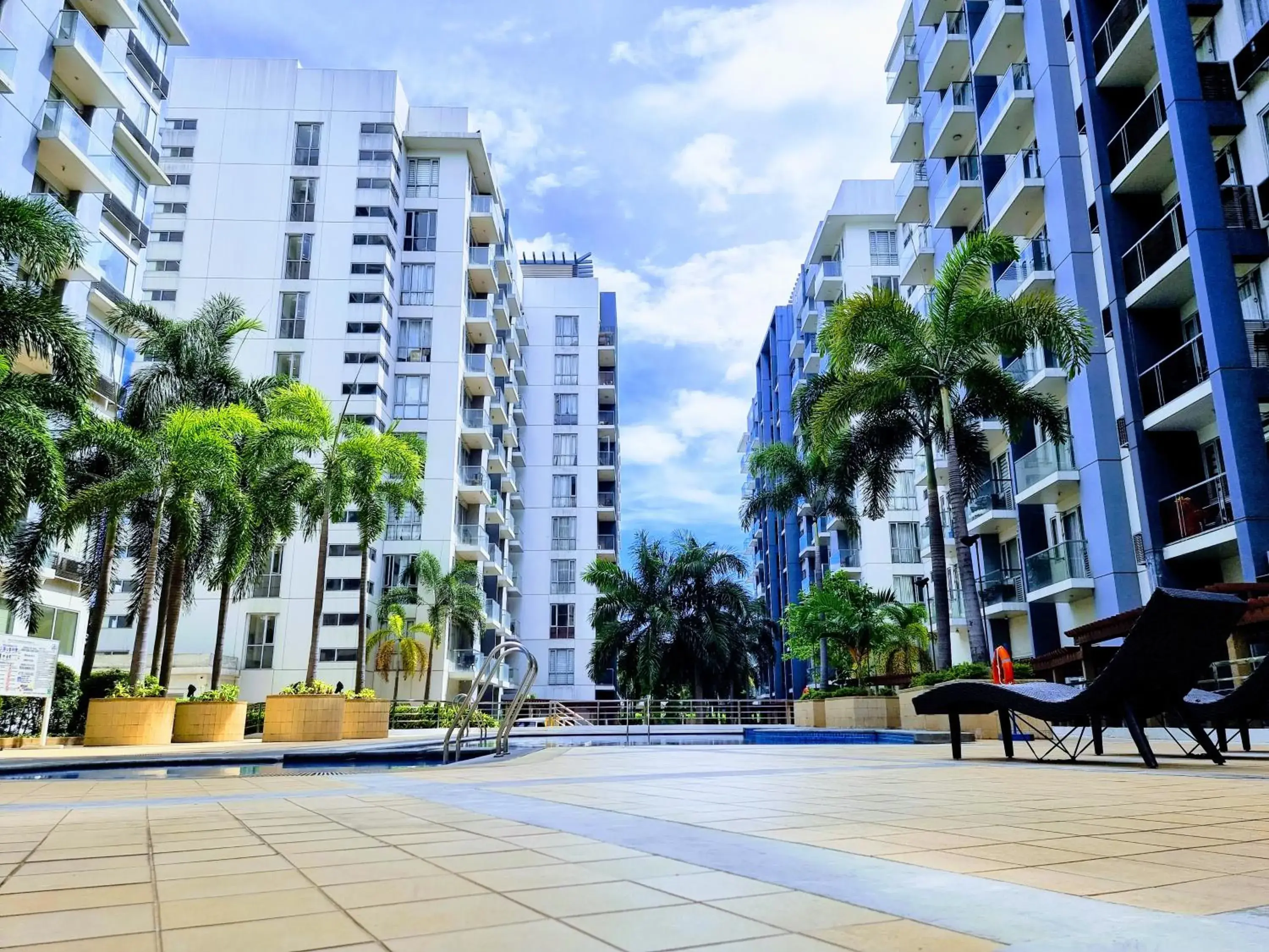Swimming pool in One Palm Tree Villas Condo Across NAIA Terminal 3 Swimming pool in One Palm Tree Villas Condo Across NAIA Terminal 3