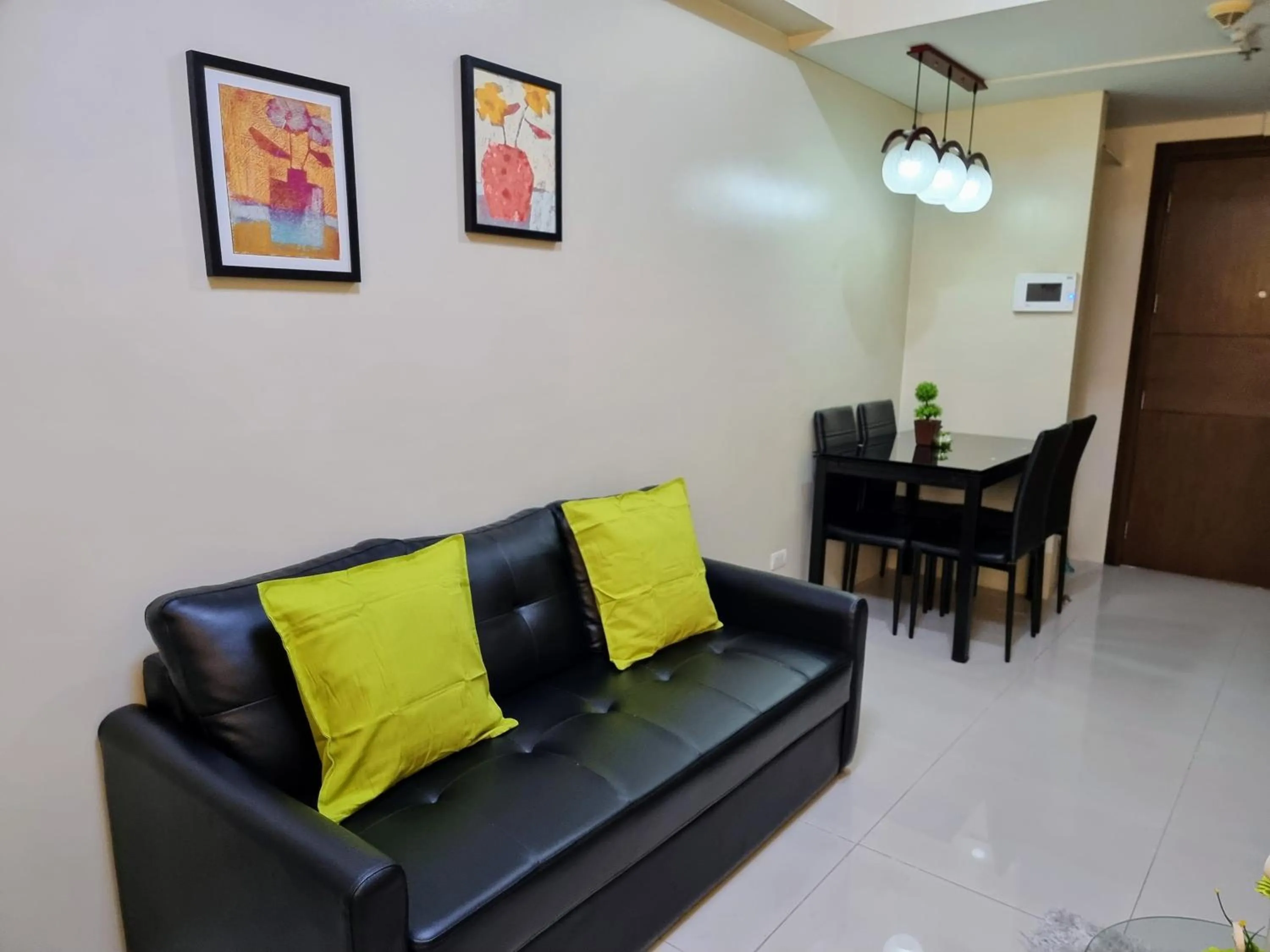 Seating area in One Palm Tree Villas Condo Across NAIA Terminal 3