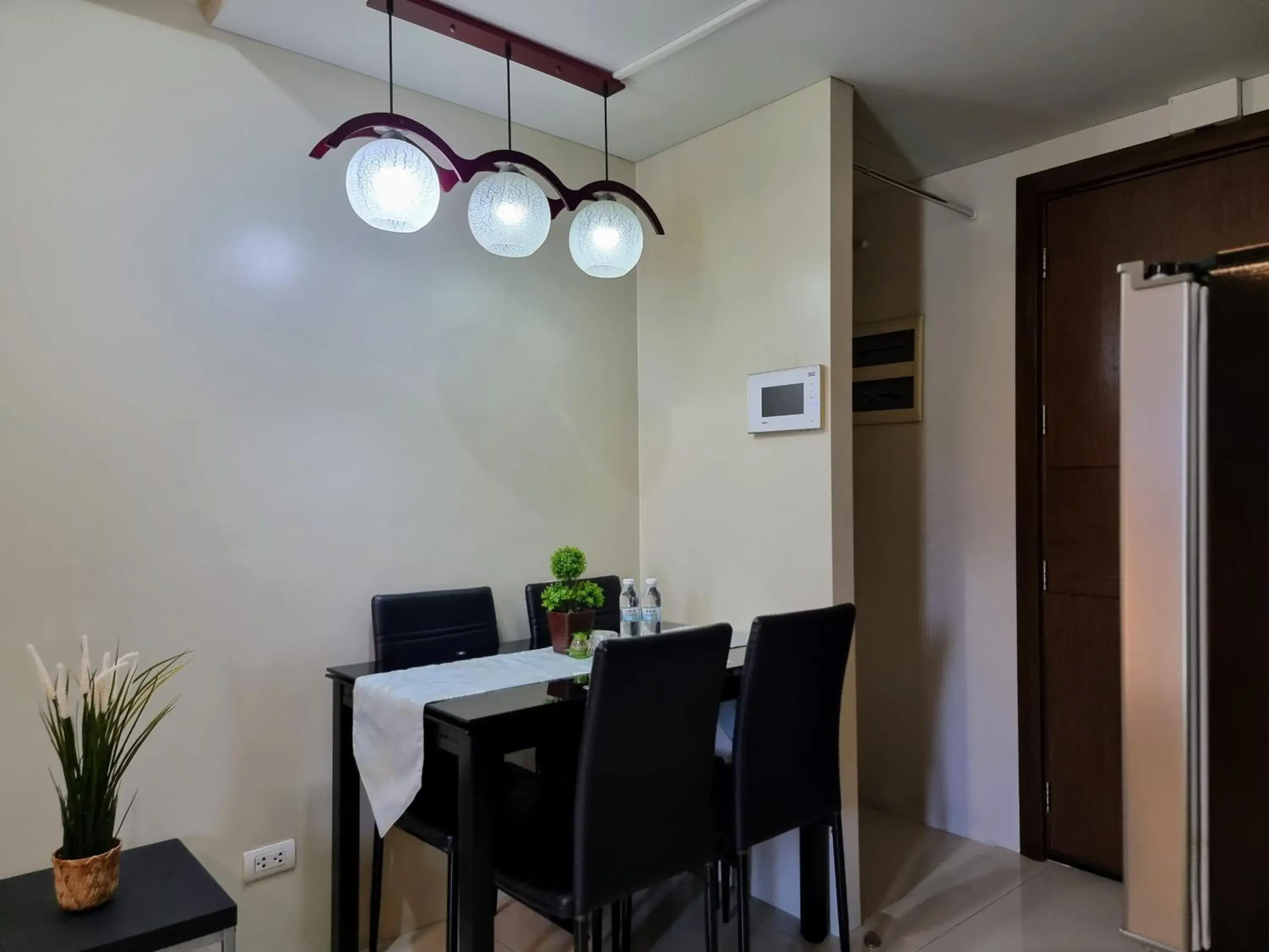 Dining area in One Palm Tree Villas Condo Across NAIA Terminal 3 Dining area in One Palm Tree Villas Condo Across NAIA Terminal 3