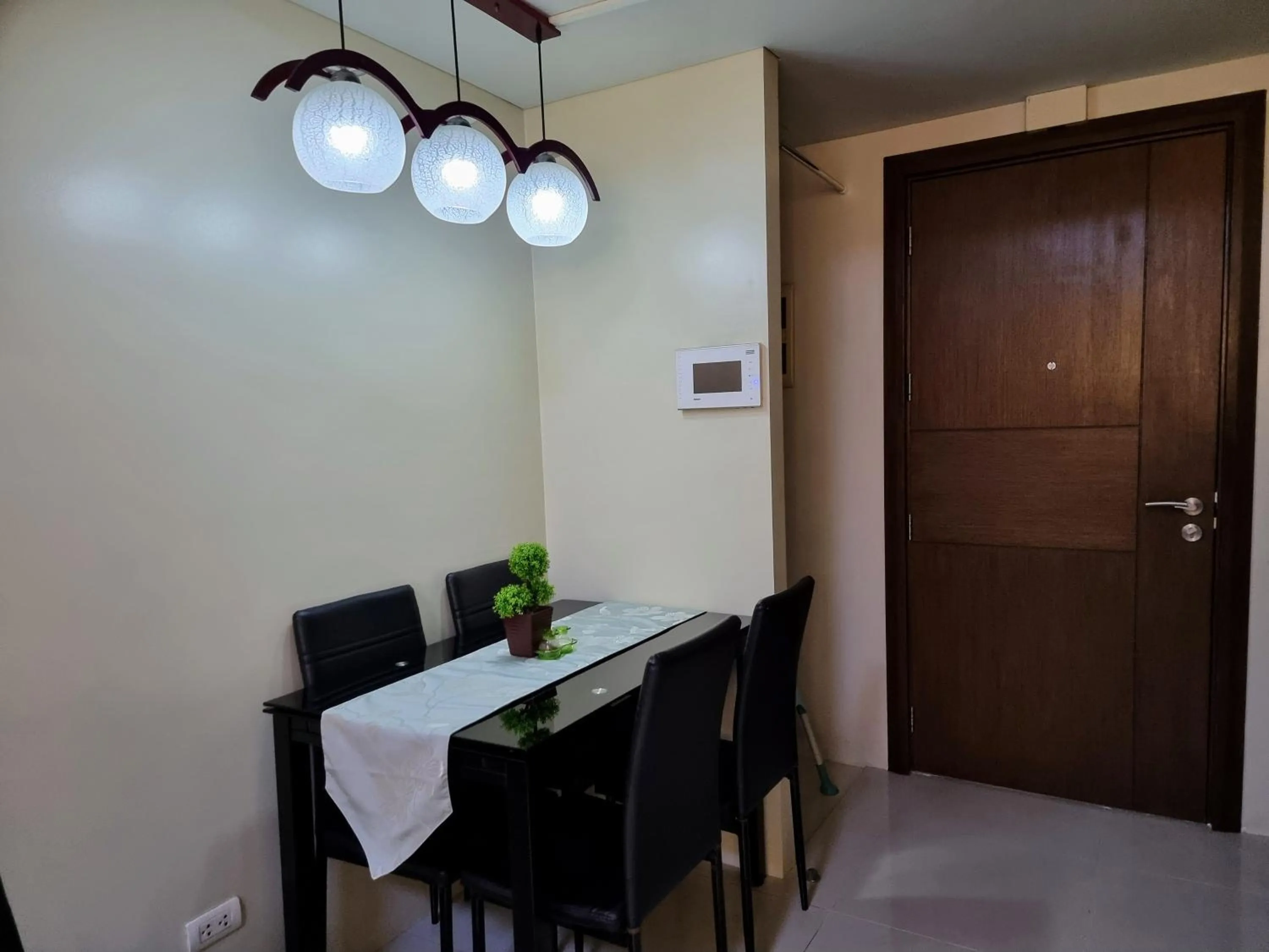 Dining area in One Palm Tree Villas Condo Across NAIA Terminal 3