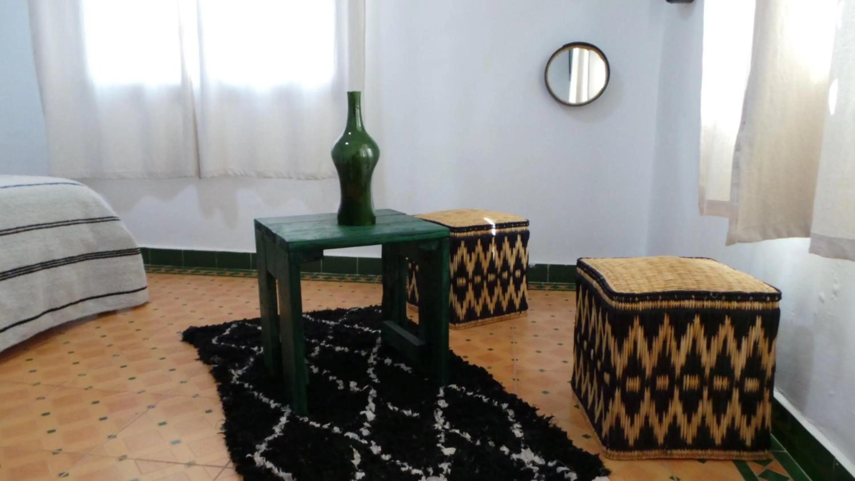 Seating area, Bed in Targafit Hotel & Hammam