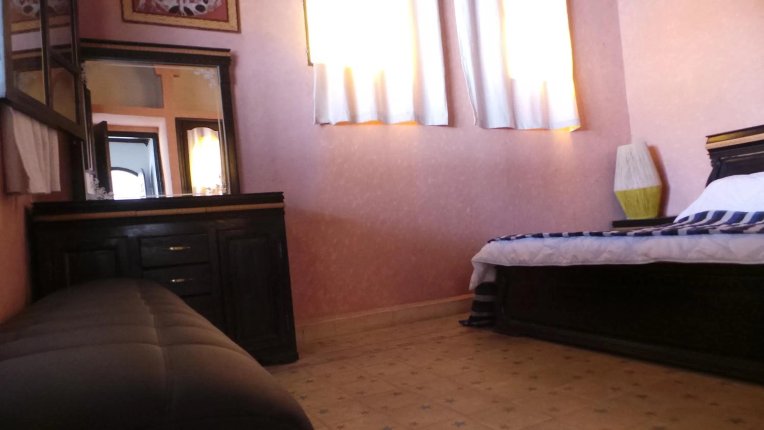 Photo of the whole room, Bed in Targafit Hotel & Hammam