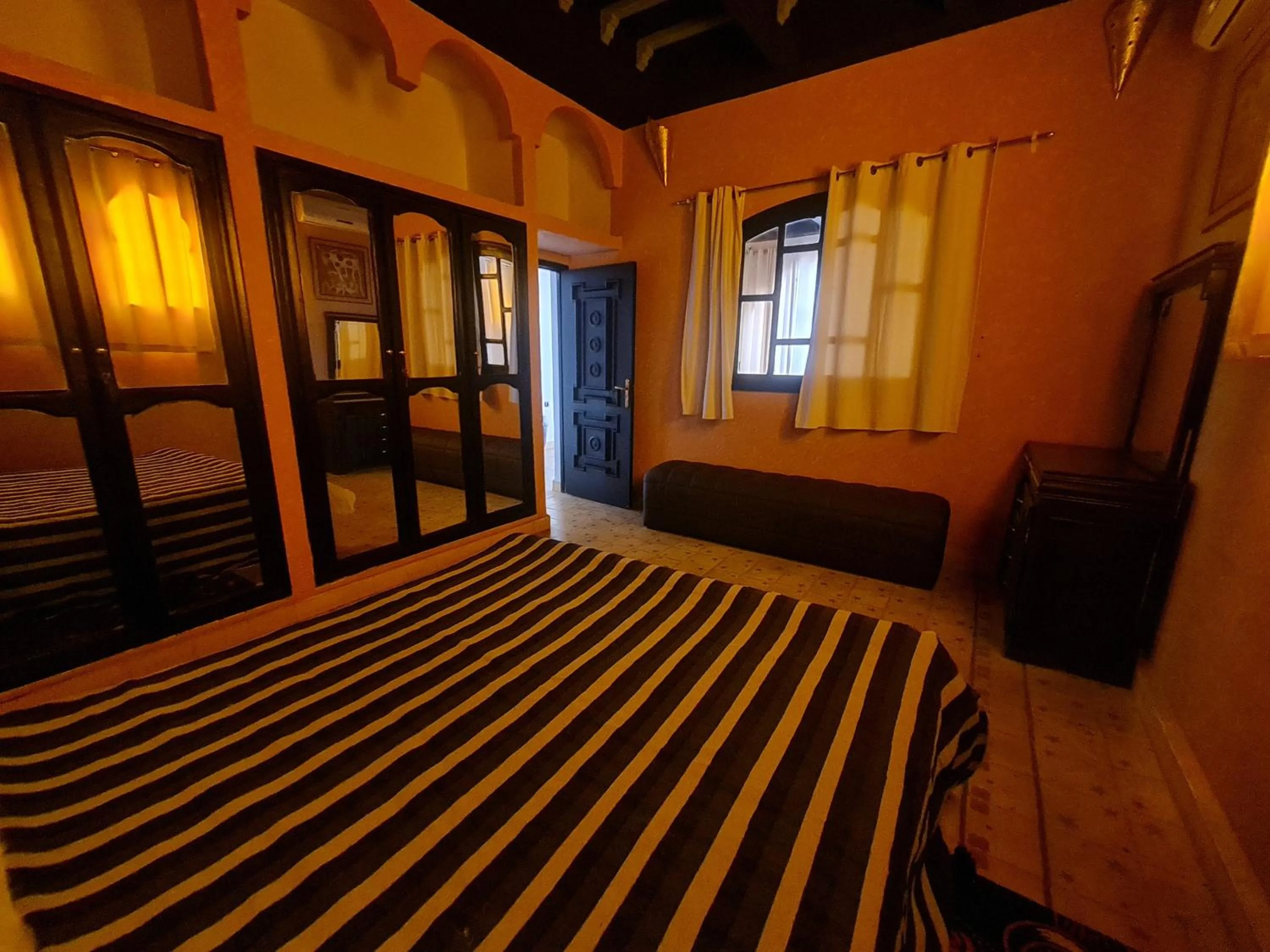 Photo of the whole room, Bed in Targafit Hotel & Hammam