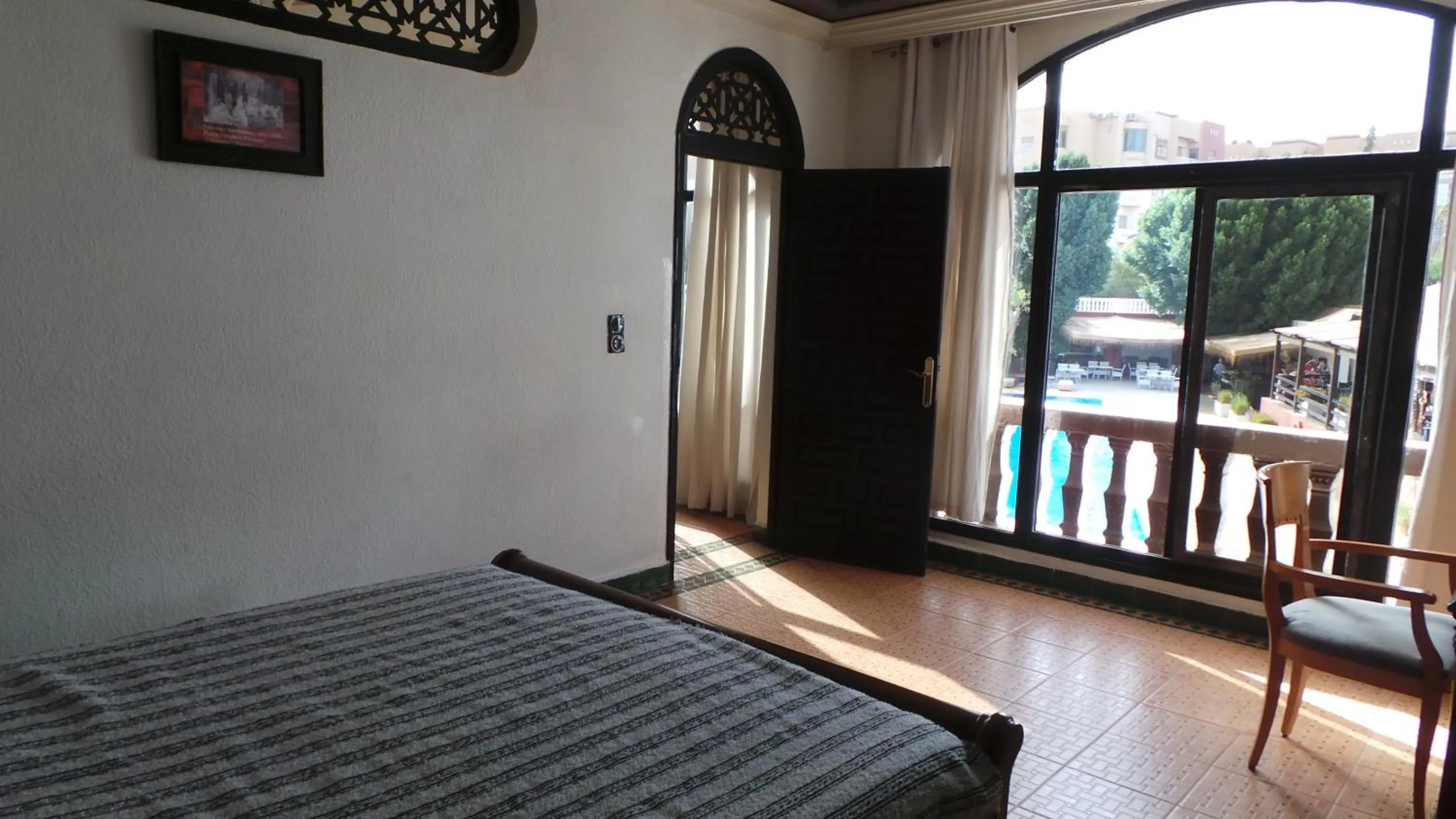 Photo of the whole room, Bed in Targafit Hotel & Hammam