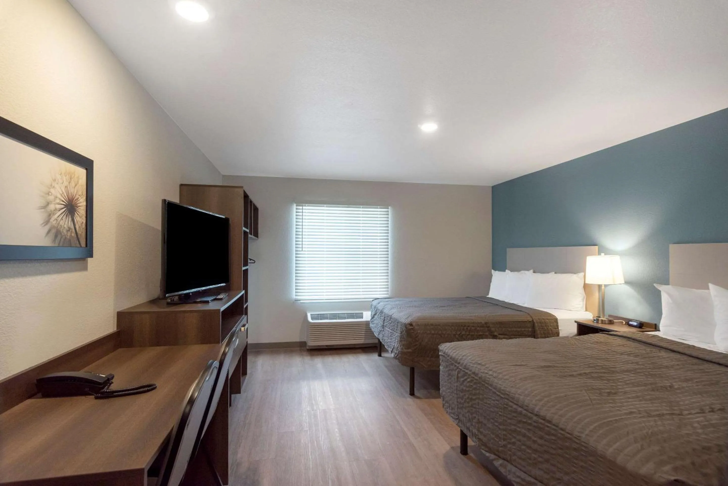 Bedroom, Bed in WoodSpring Suites Colorado Springs North - Air Force Academy