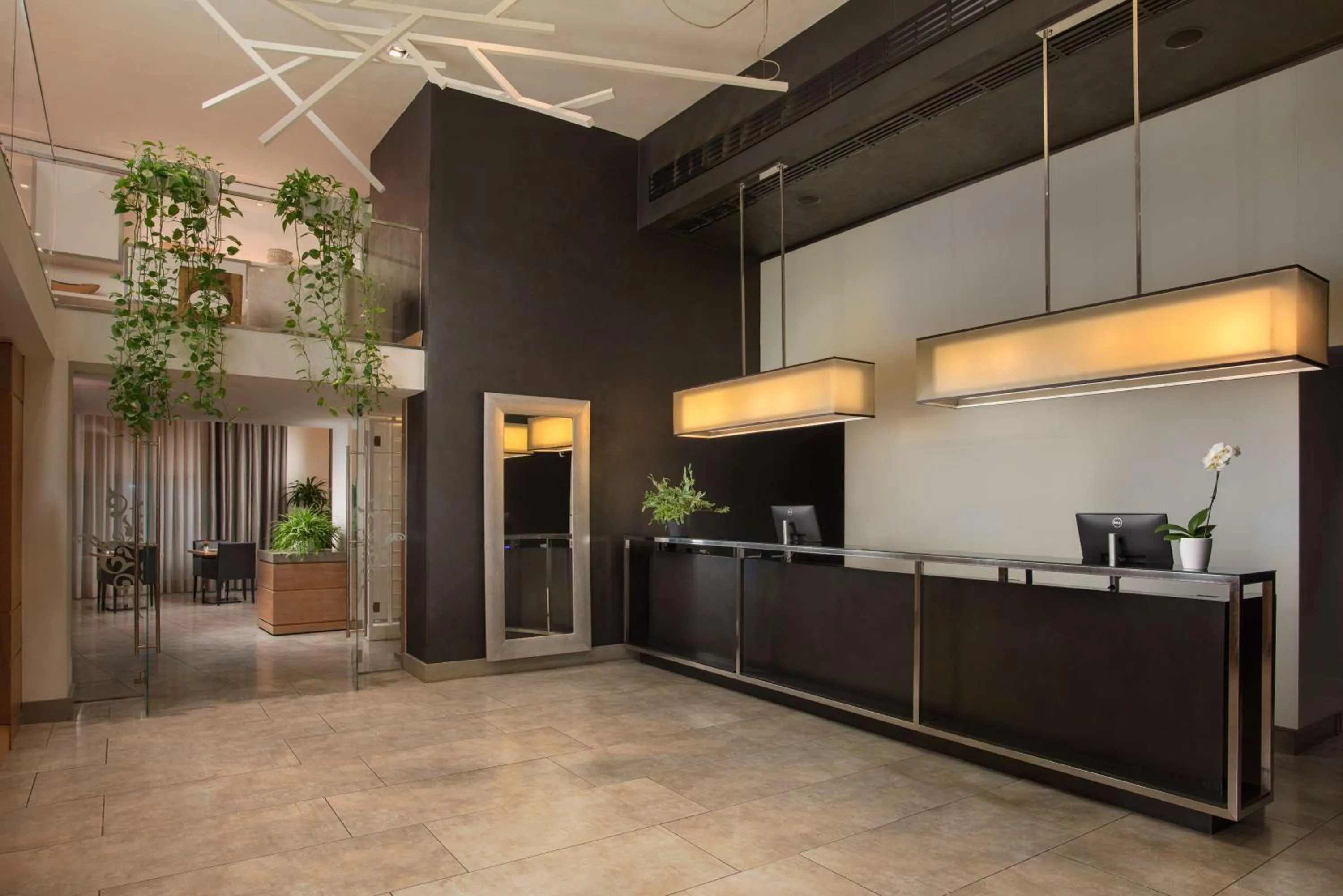 Lobby or reception in NH Pisa