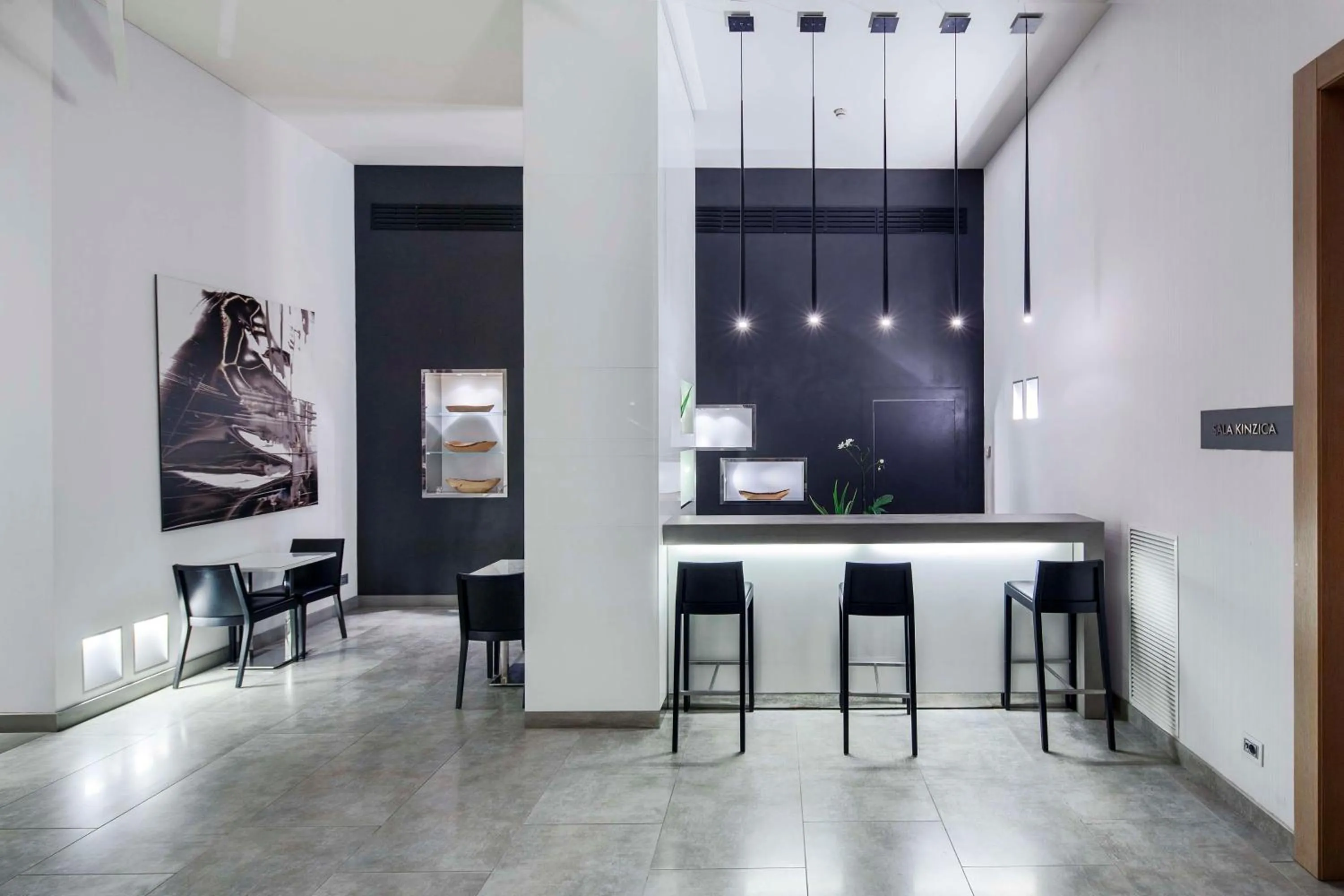 Lobby or reception in NH Pisa