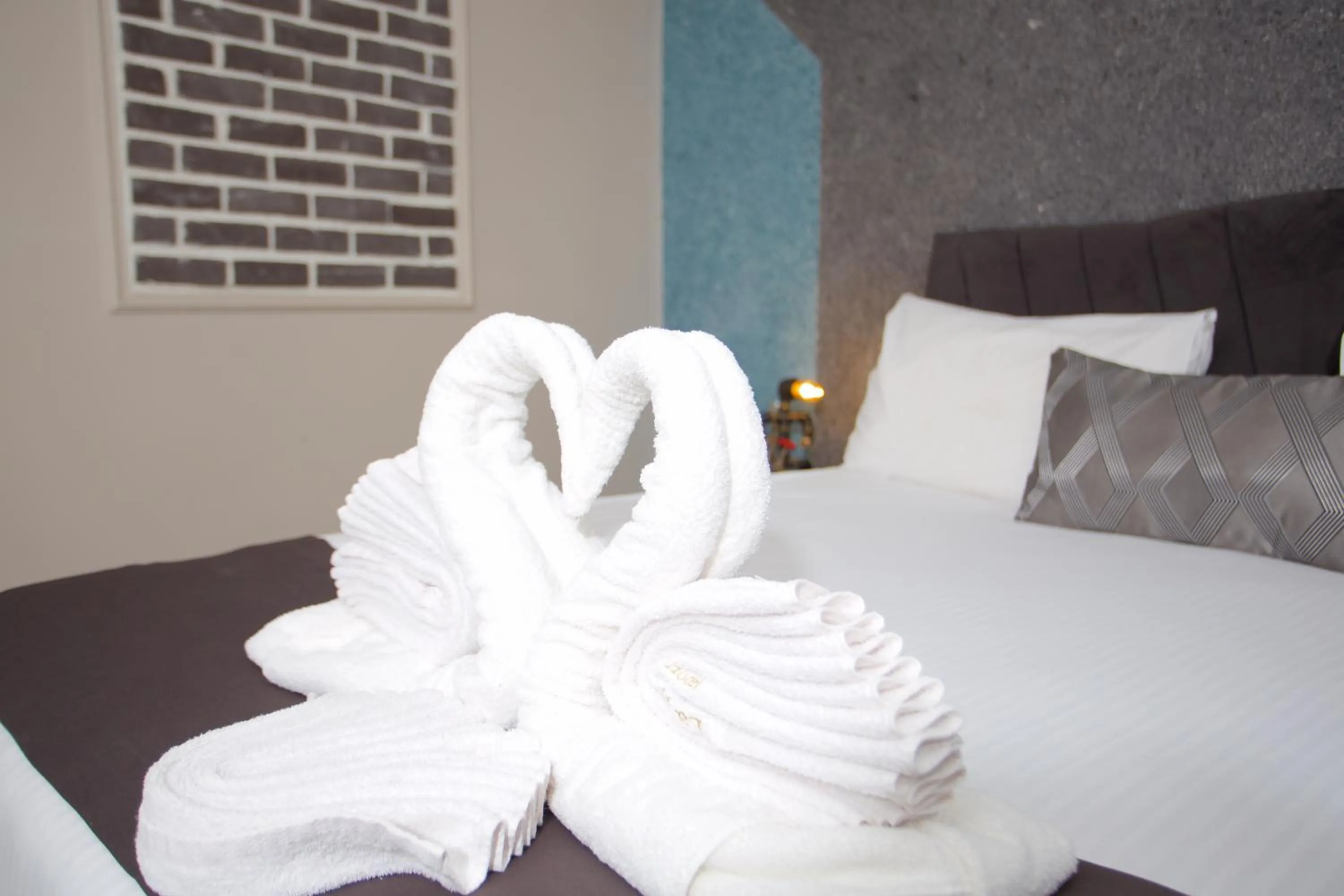 Bed in La Vida Old City Hotel