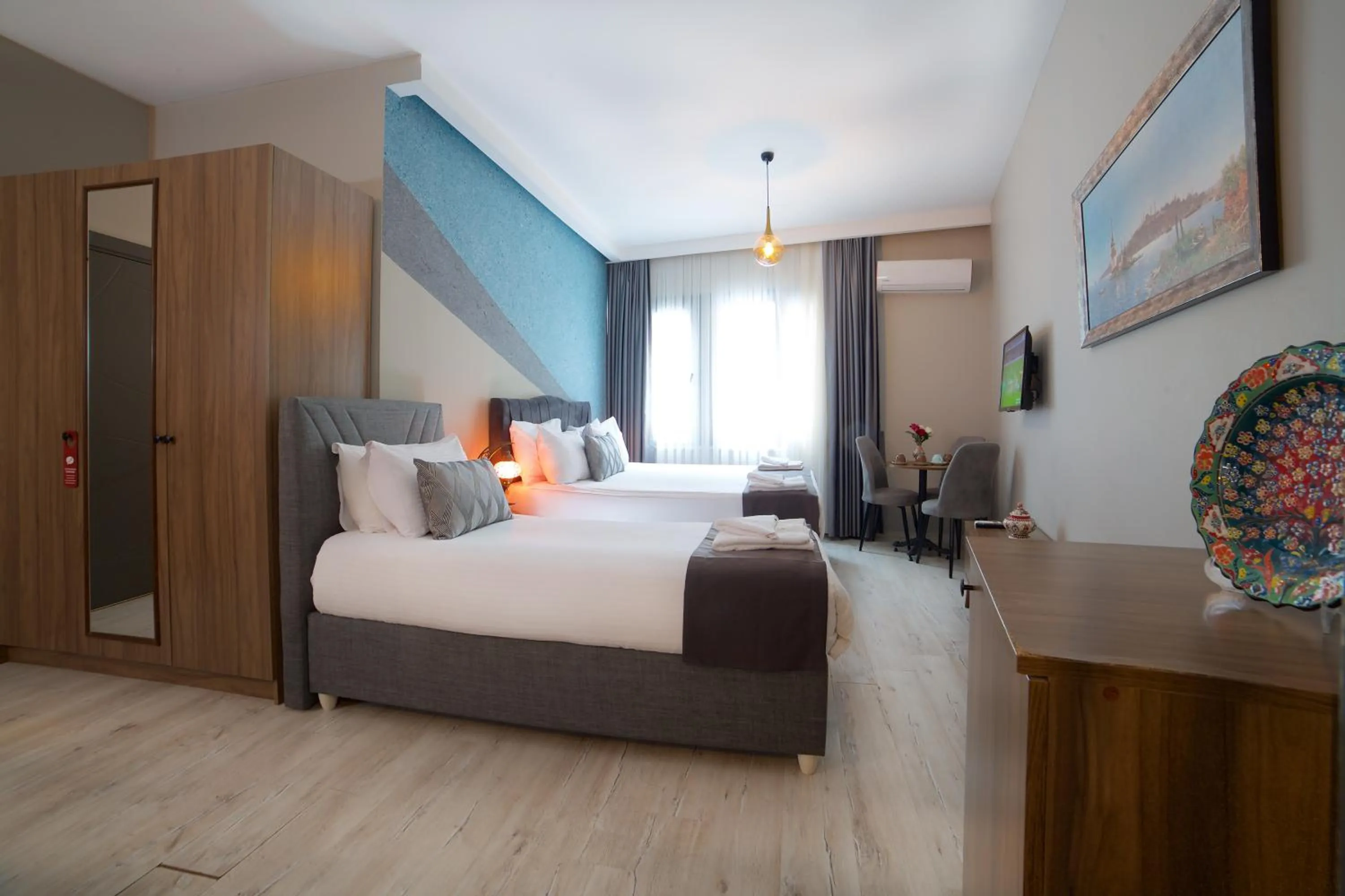 Bed in La Vida Old City Hotel