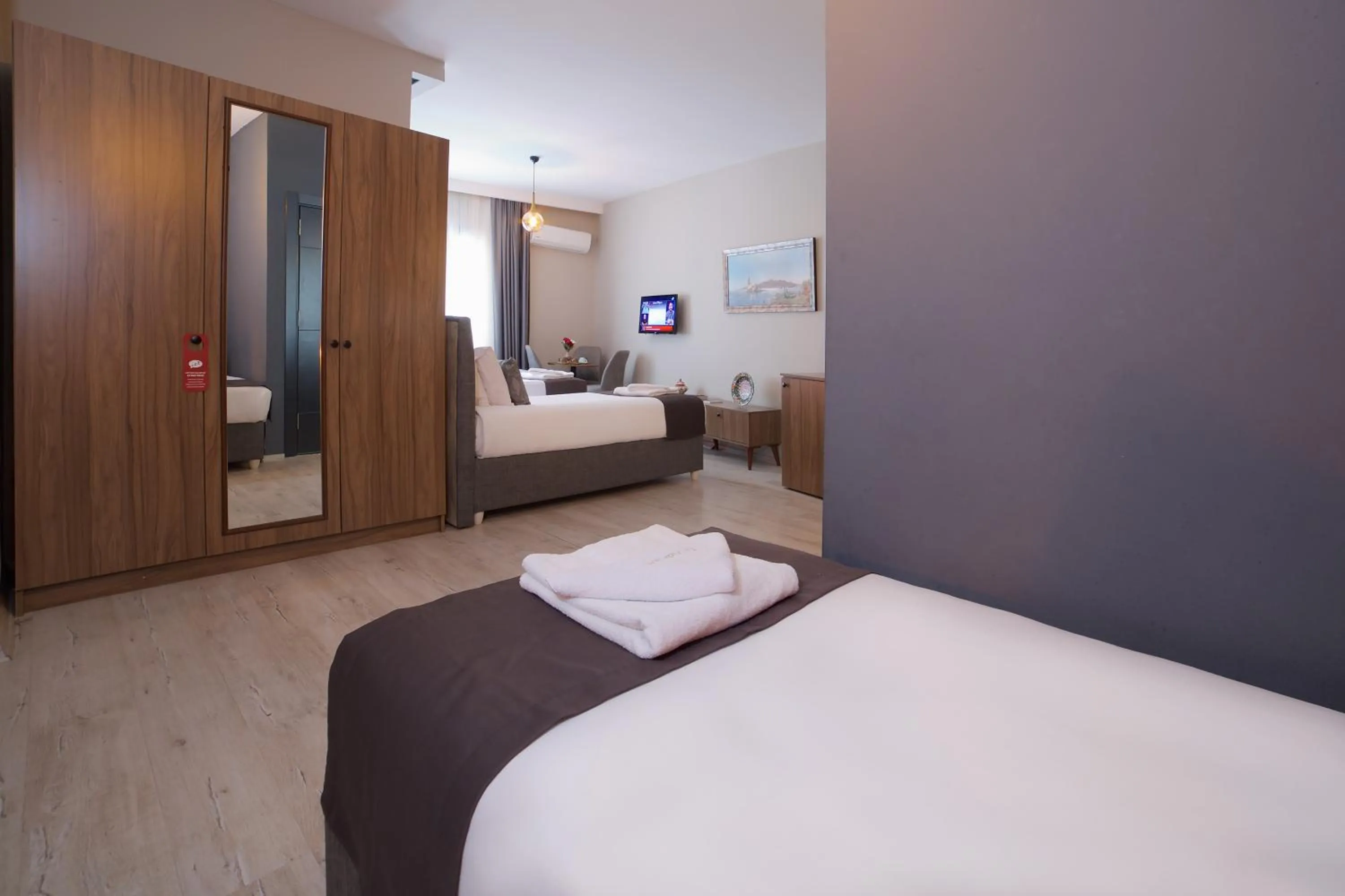 Bed in La Vida Old City Hotel