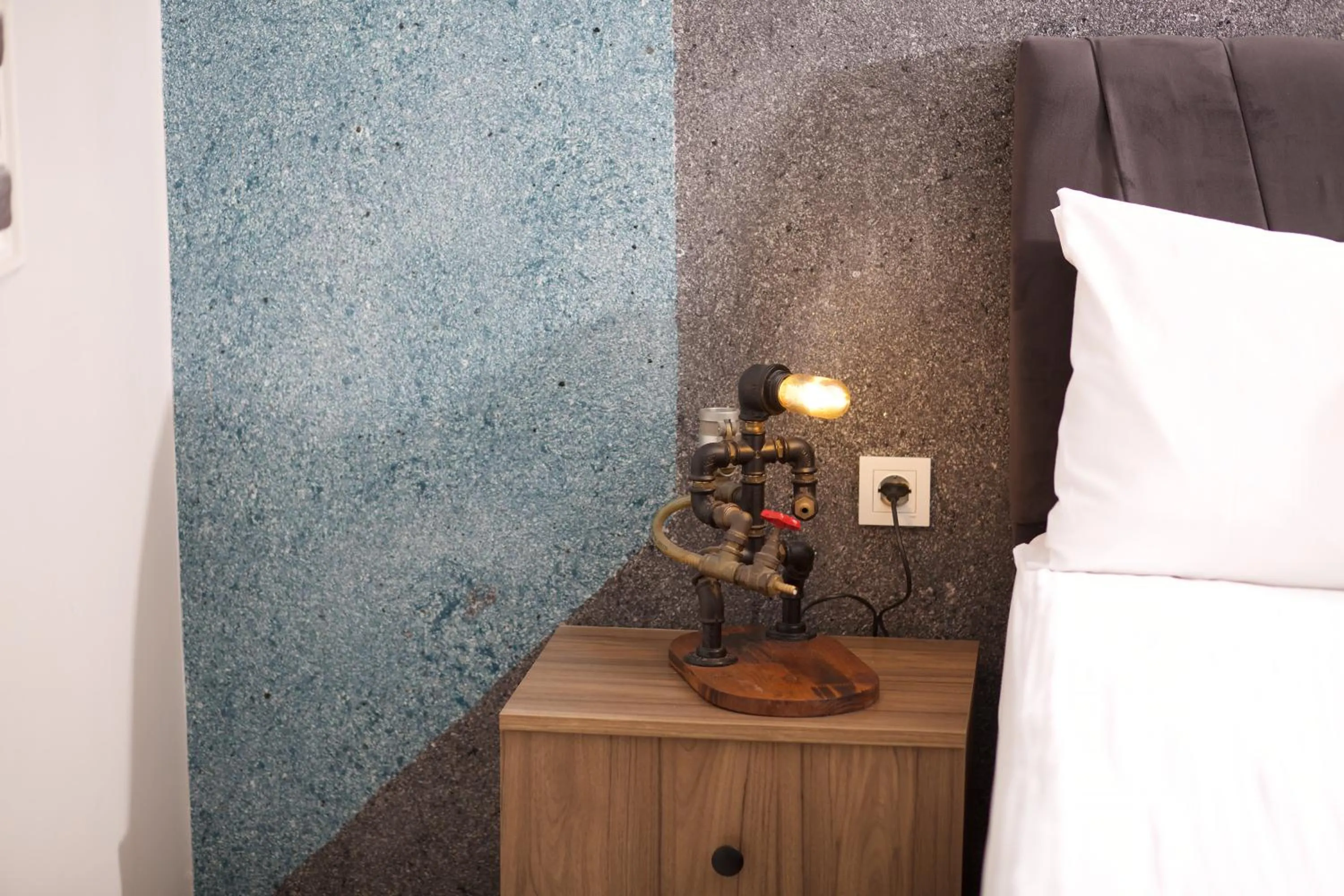 Bed in La Vida Old City Hotel