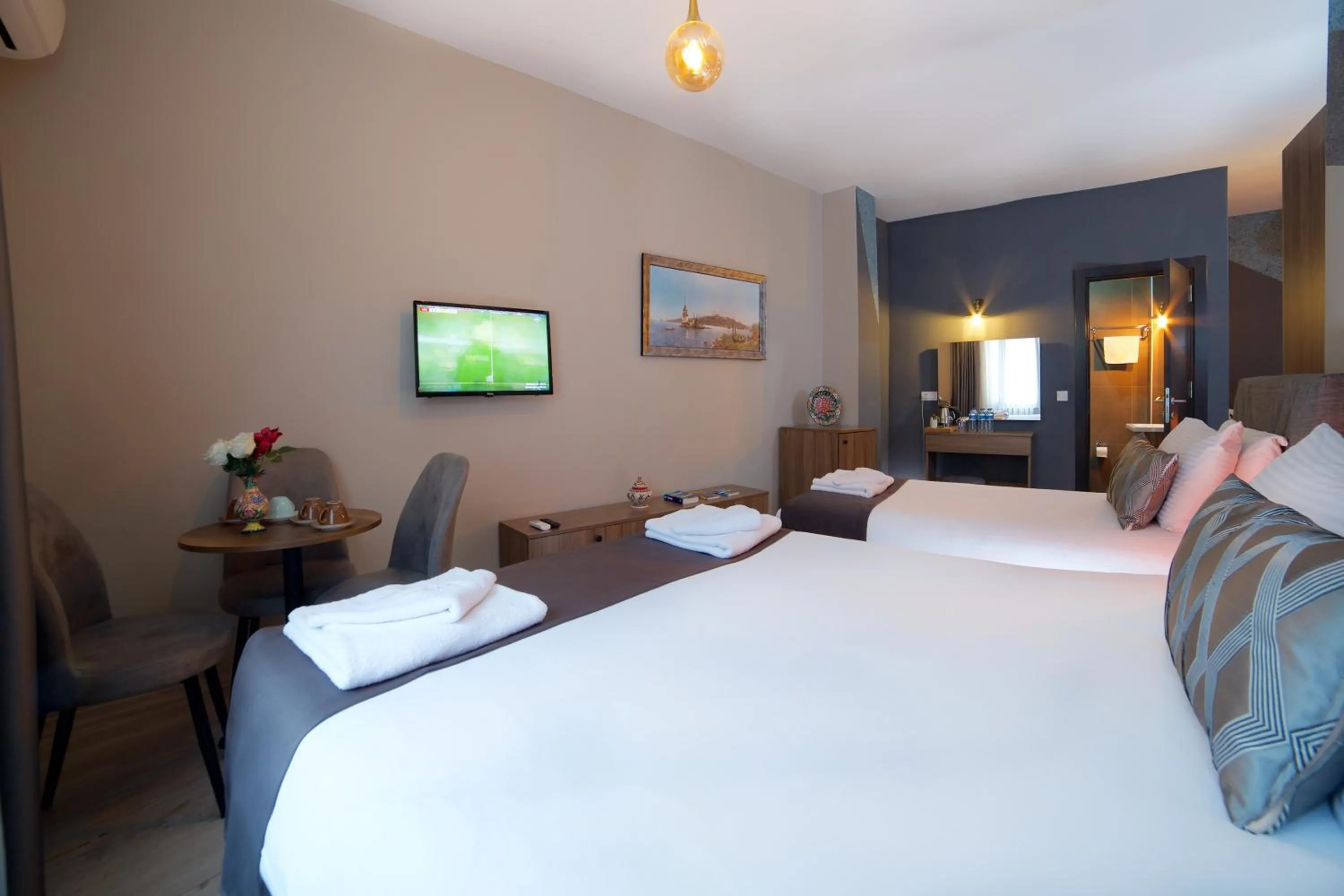 Bed in La Vida Old City Hotel