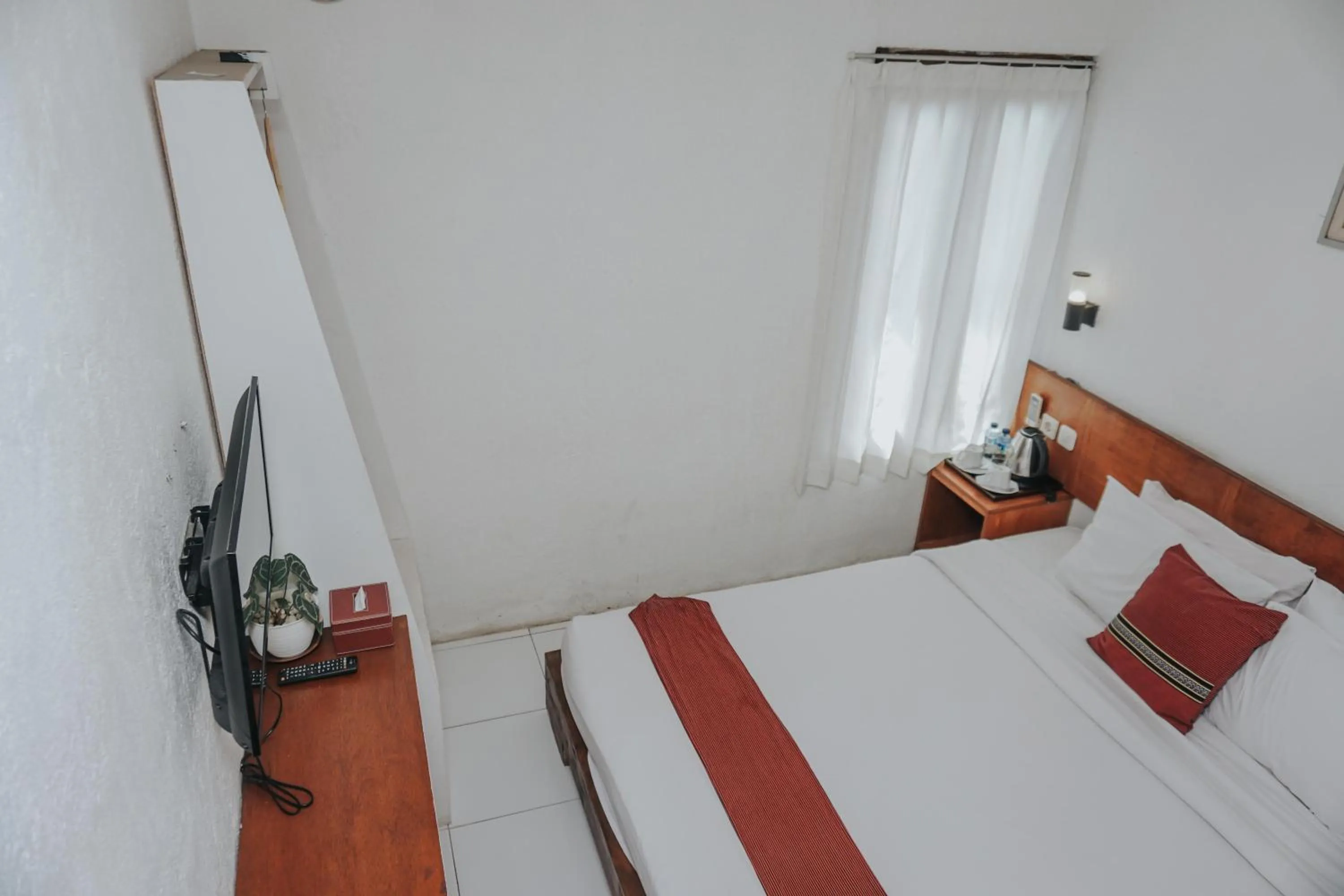 Bed in Cempaka Borobudur Guest House