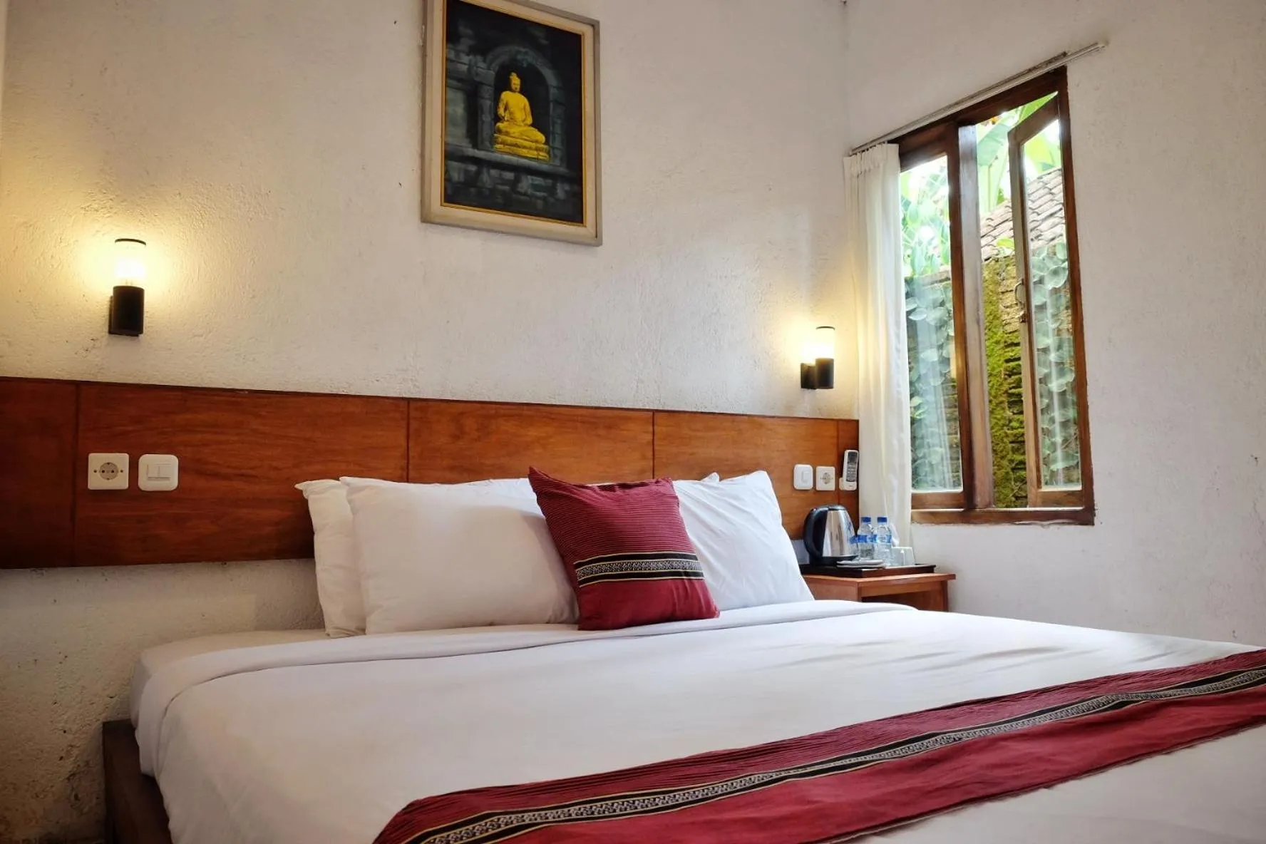 Bed in Cempaka Borobudur Guest House