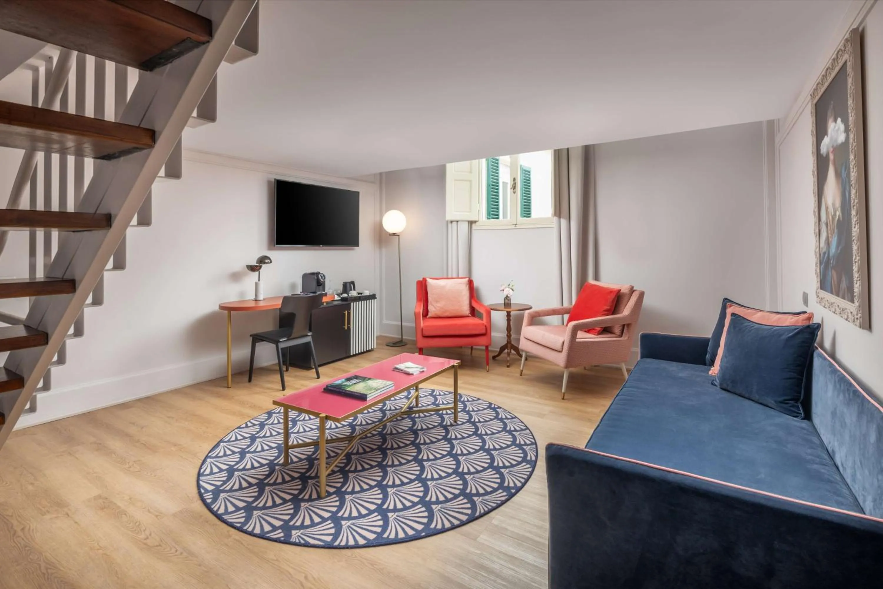 Living room in Anglo American Hotel Florence, Curio Collection By Hilton