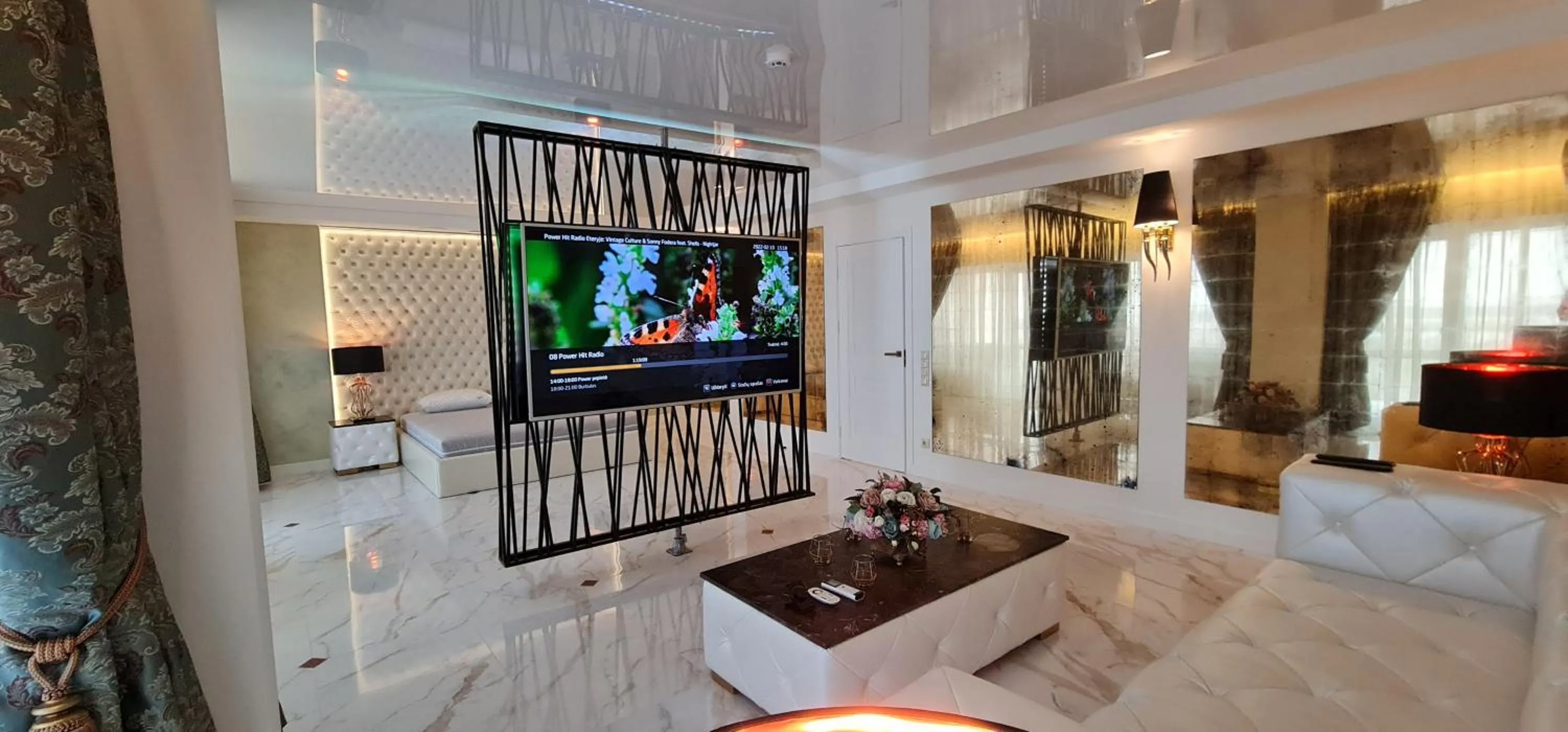 TV and multimedia in Prestige Jacuzzi Apartment by LIUKSAI