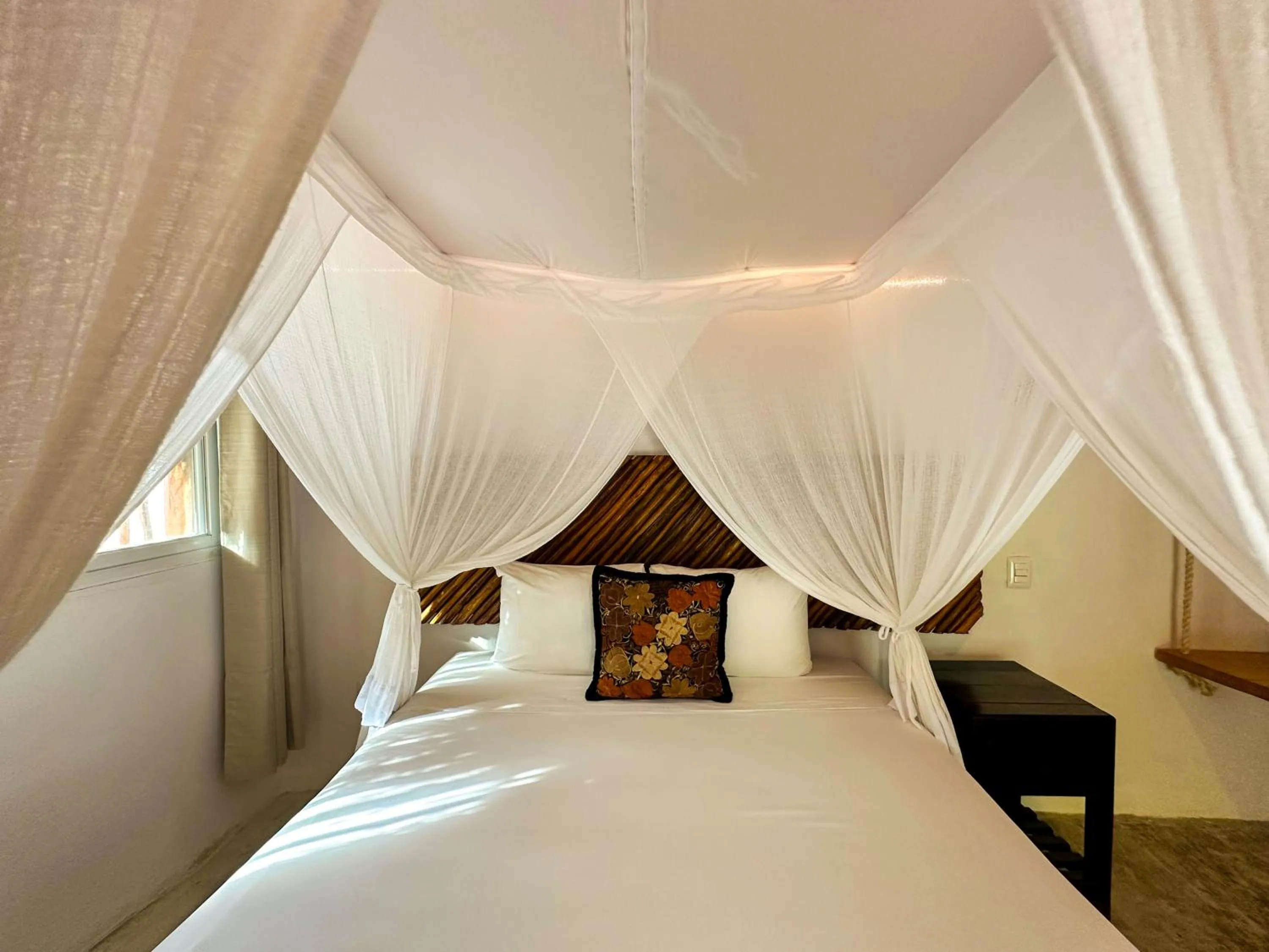 Bed in Alito Tulum Hotel