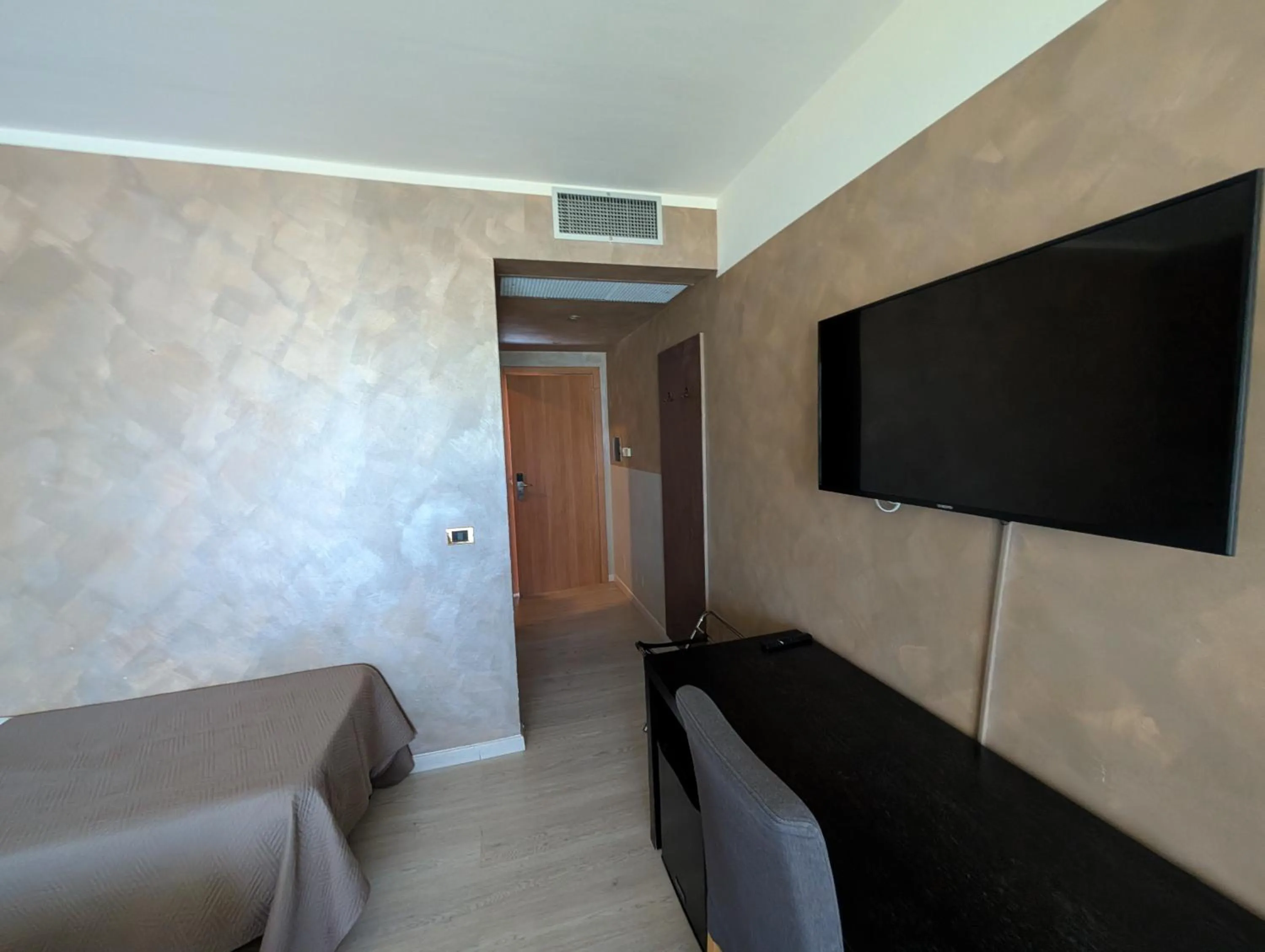 Bedroom in Hotel Carignano