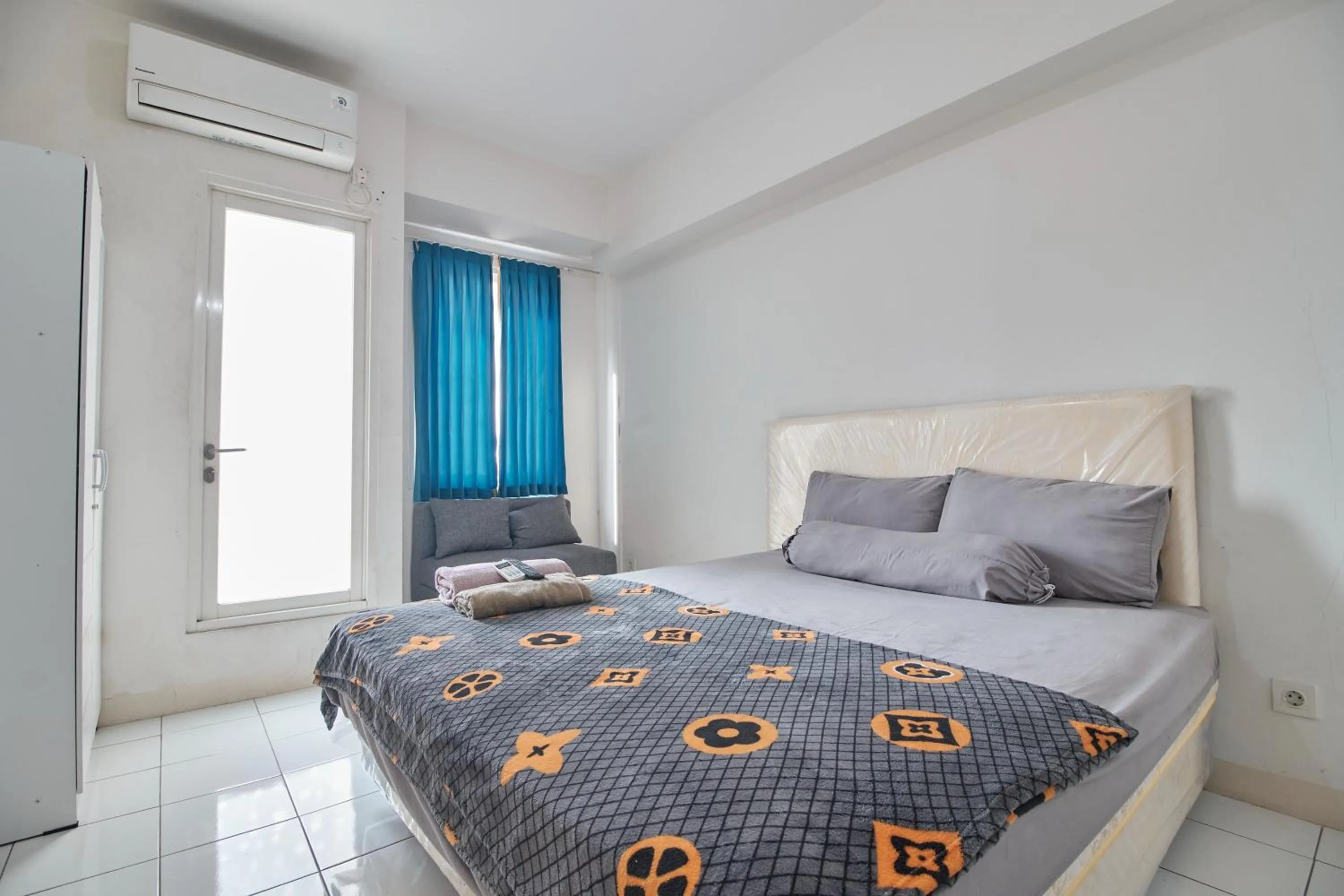 Bed in Room Rendi Podomoro Golf View