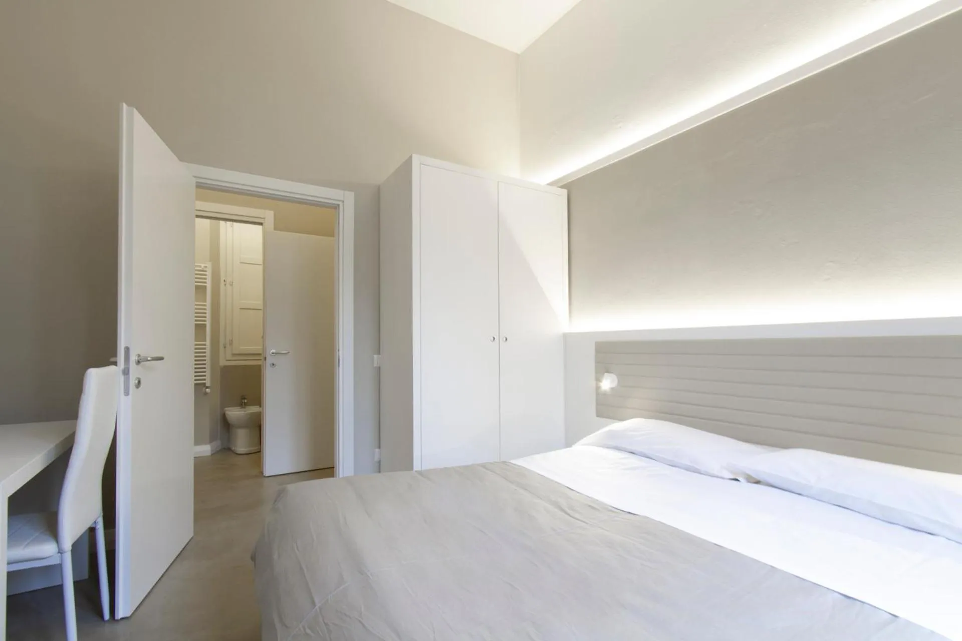 Bed in Palazzo dei Ciompi Suites