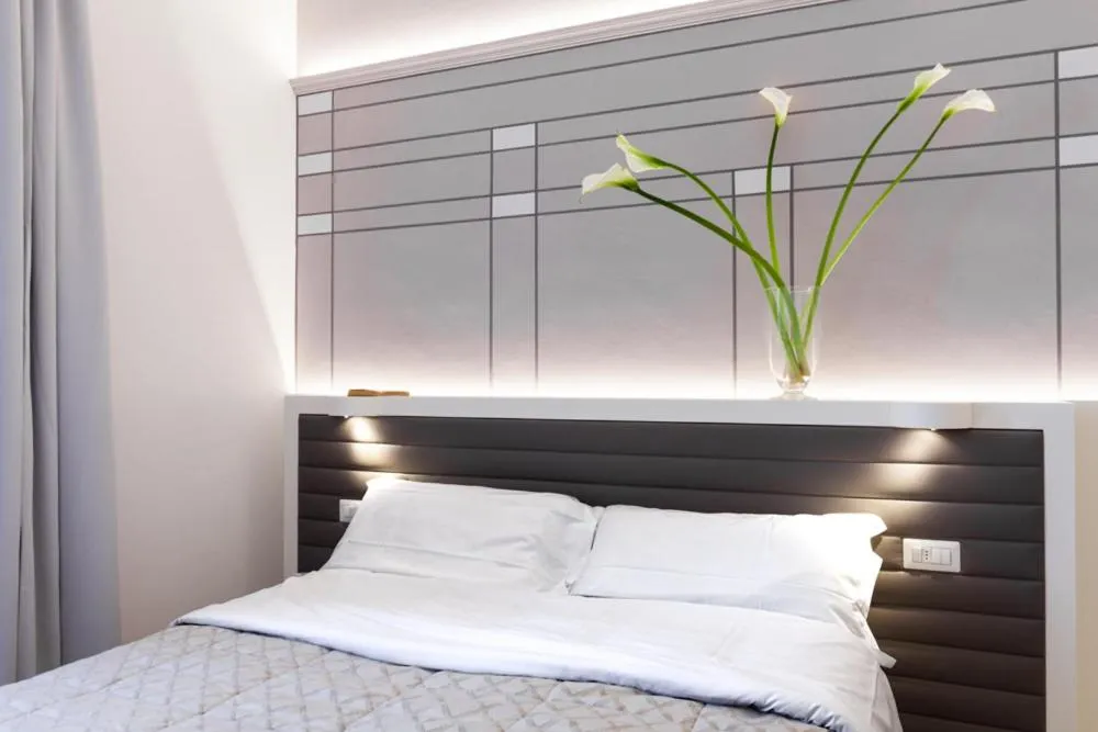 Bed in Palazzo dei Ciompi Suites