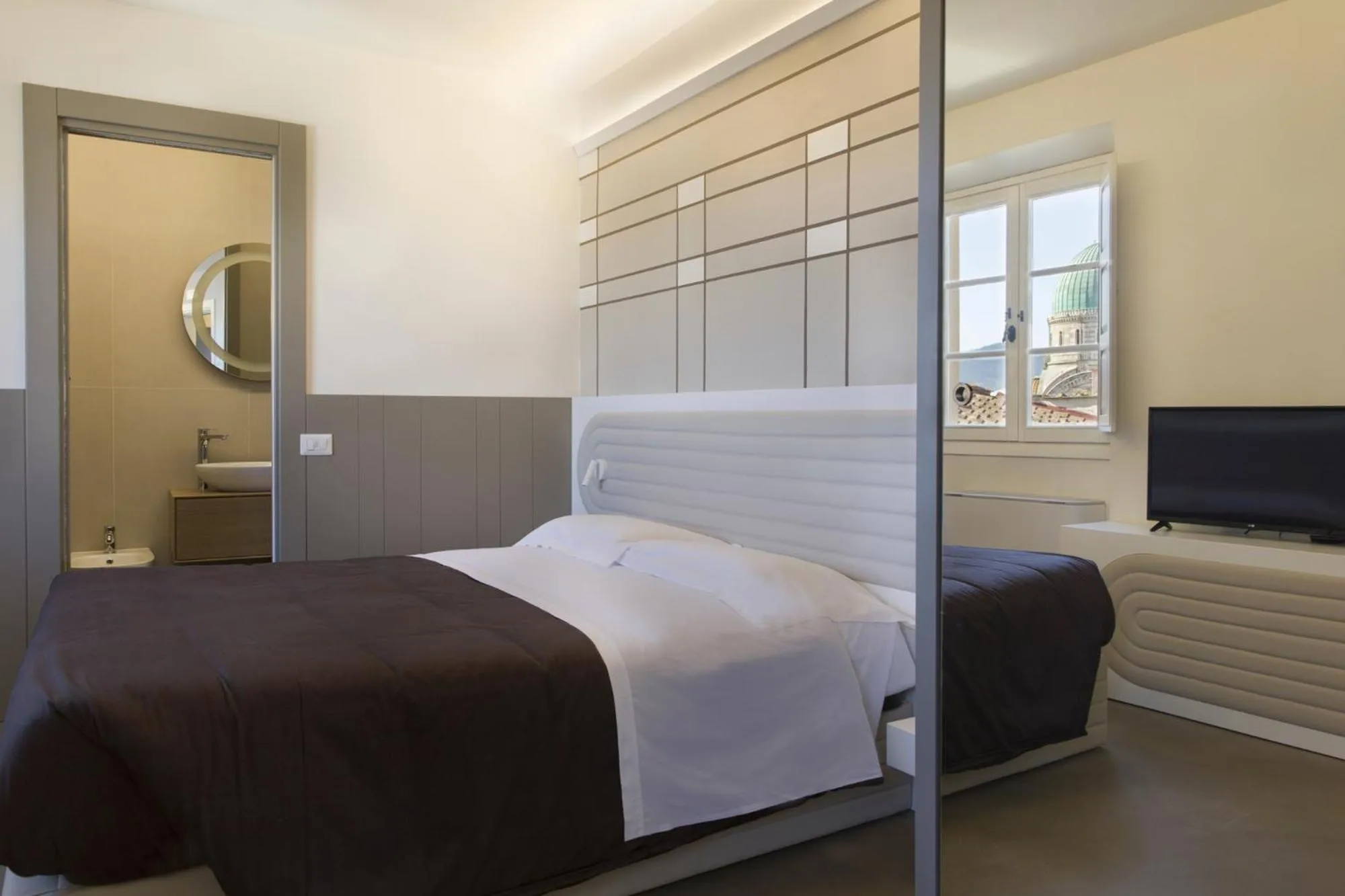 Bed in Palazzo dei Ciompi Suites