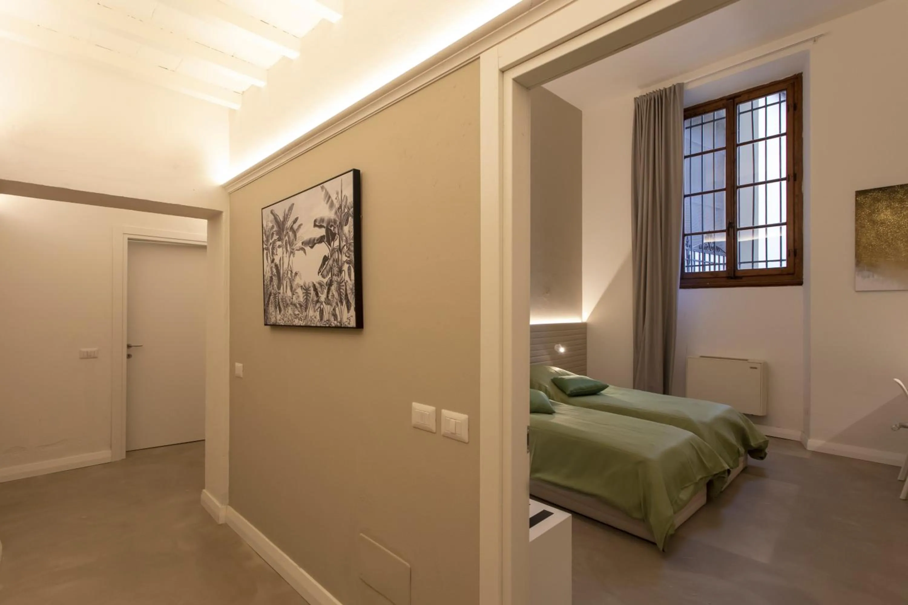 Bed in Palazzo dei Ciompi Suites