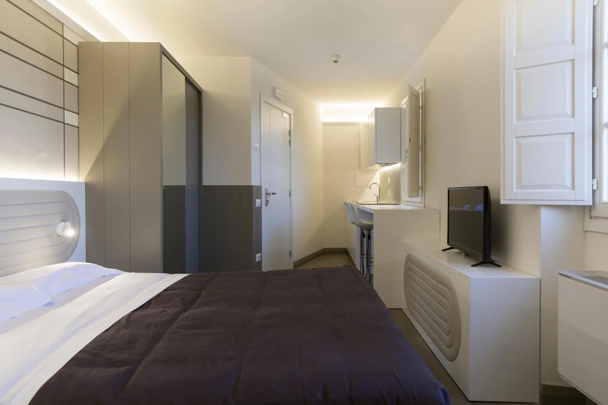 Photo of the whole room, Bed in Palazzo dei Ciompi Suites