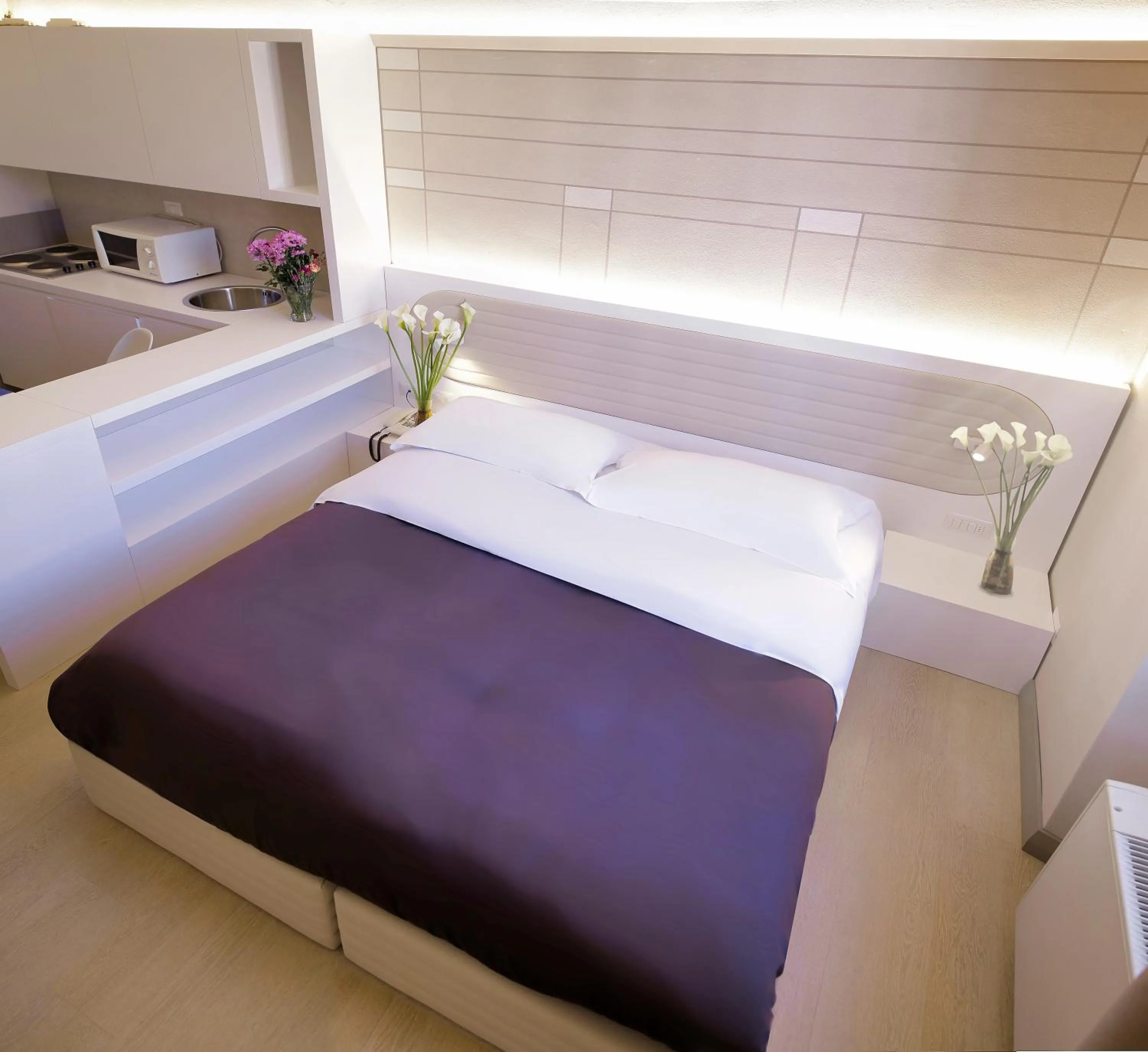 Bed in Palazzo dei Ciompi Suites