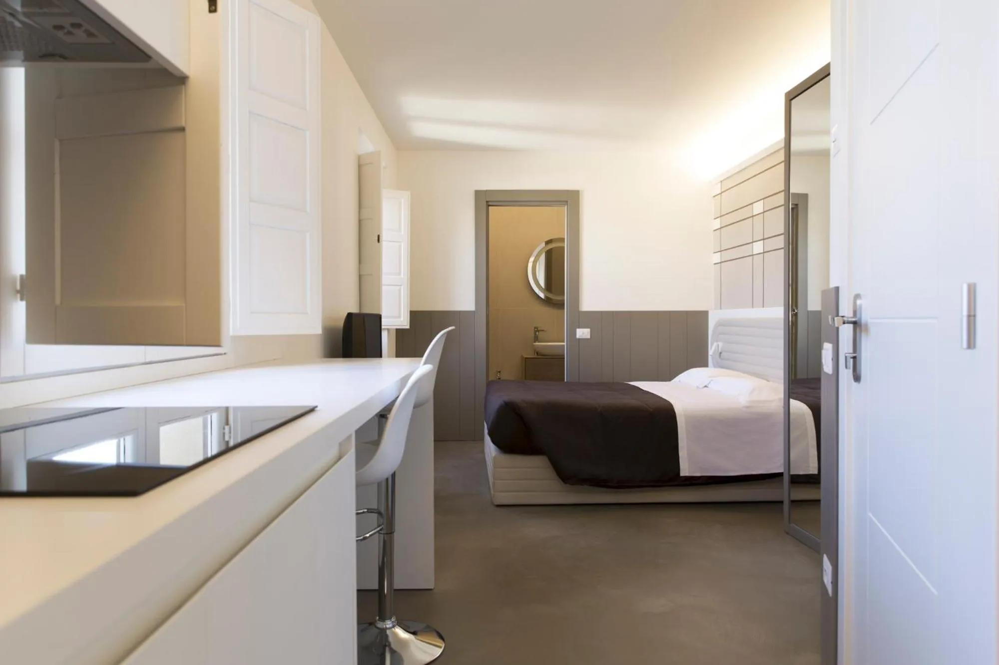Kitchen or kitchenette, Bed in Palazzo dei Ciompi Suites